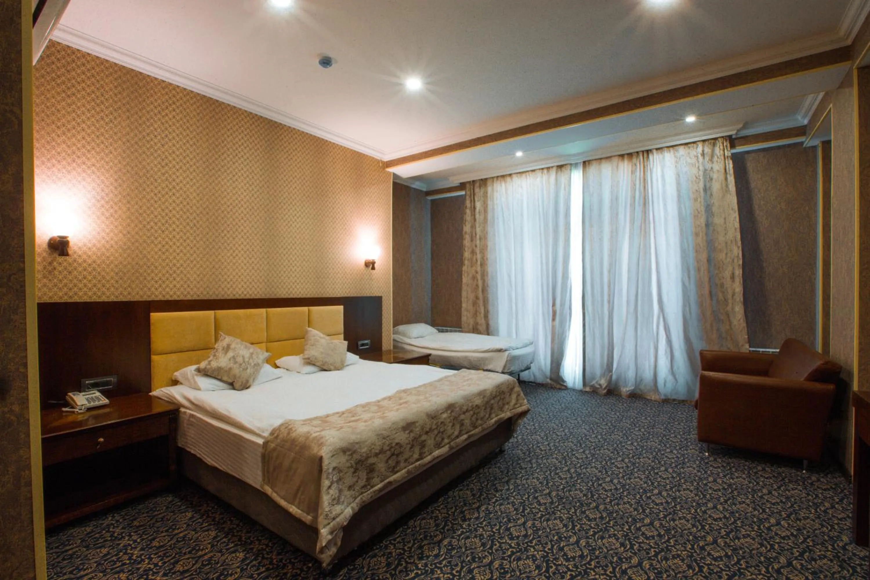 Photo of the whole room, Bed in Ruma Qala Hotel