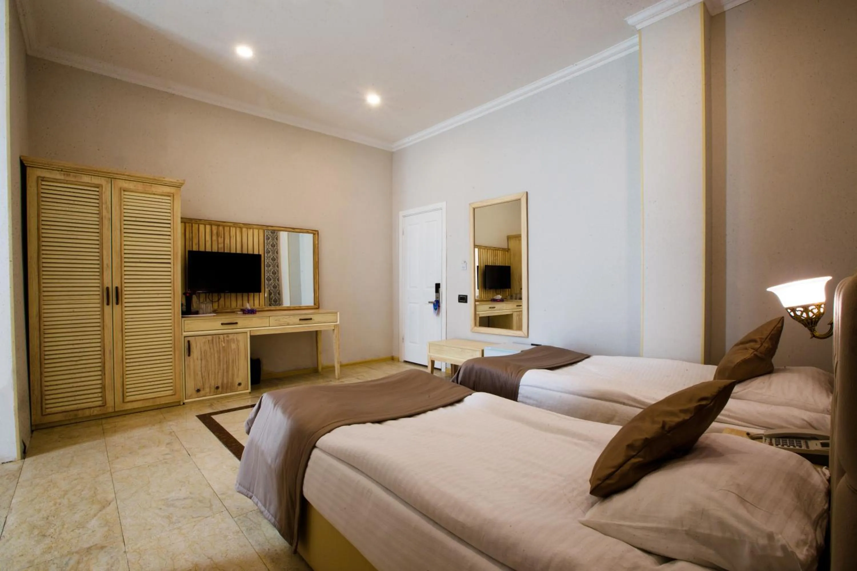 Photo of the whole room, Bed in Ruma Qala Hotel