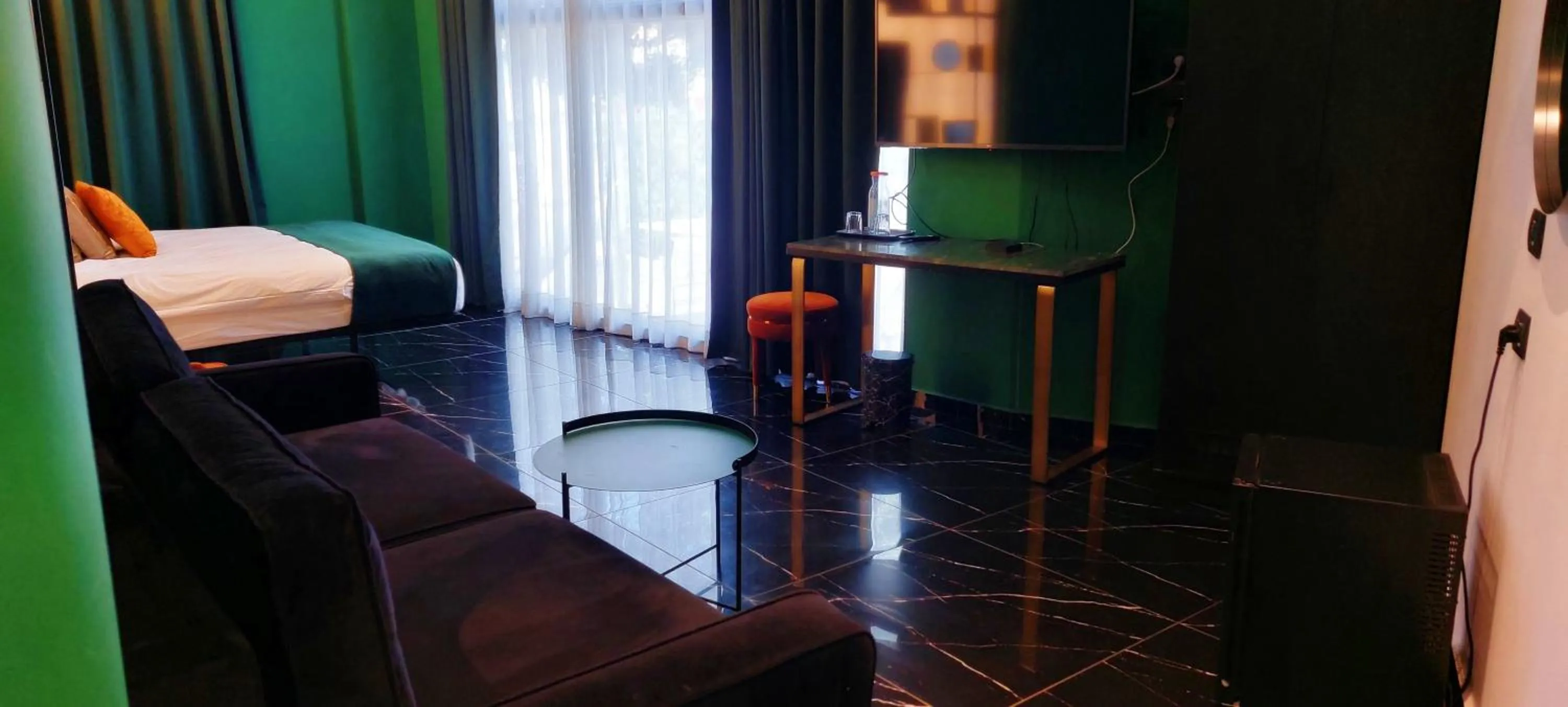 Seating area, Bed in Joseph Hotel TLV