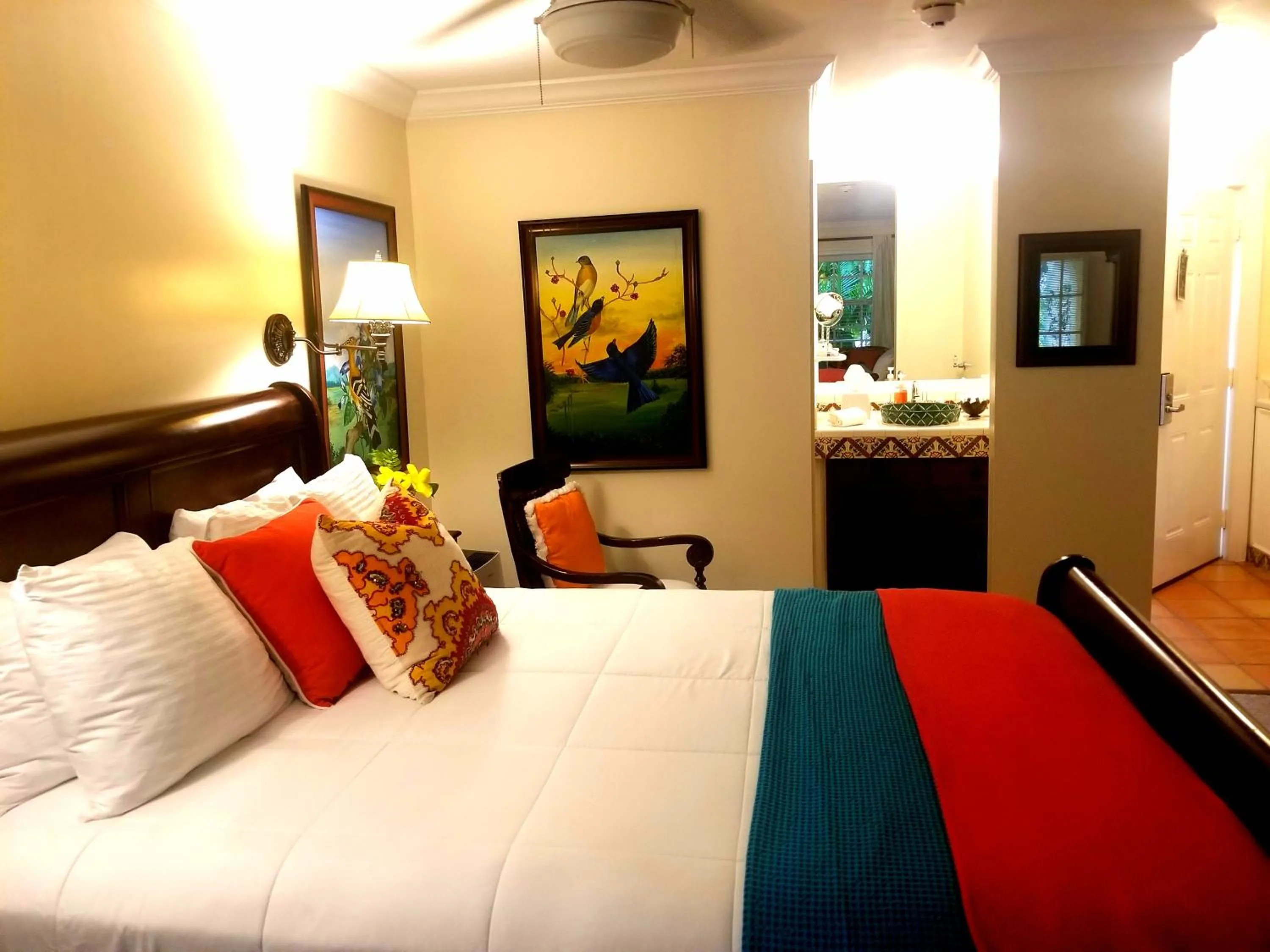 Bed in The Caribbean Court Boutique Hotel