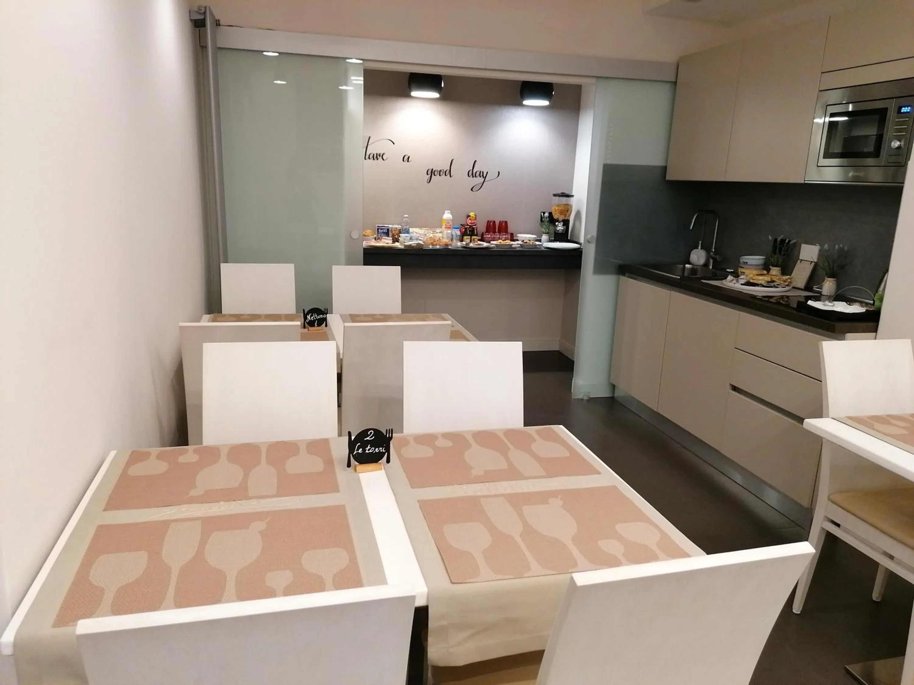 Communal kitchen in Galliera Residence B&B