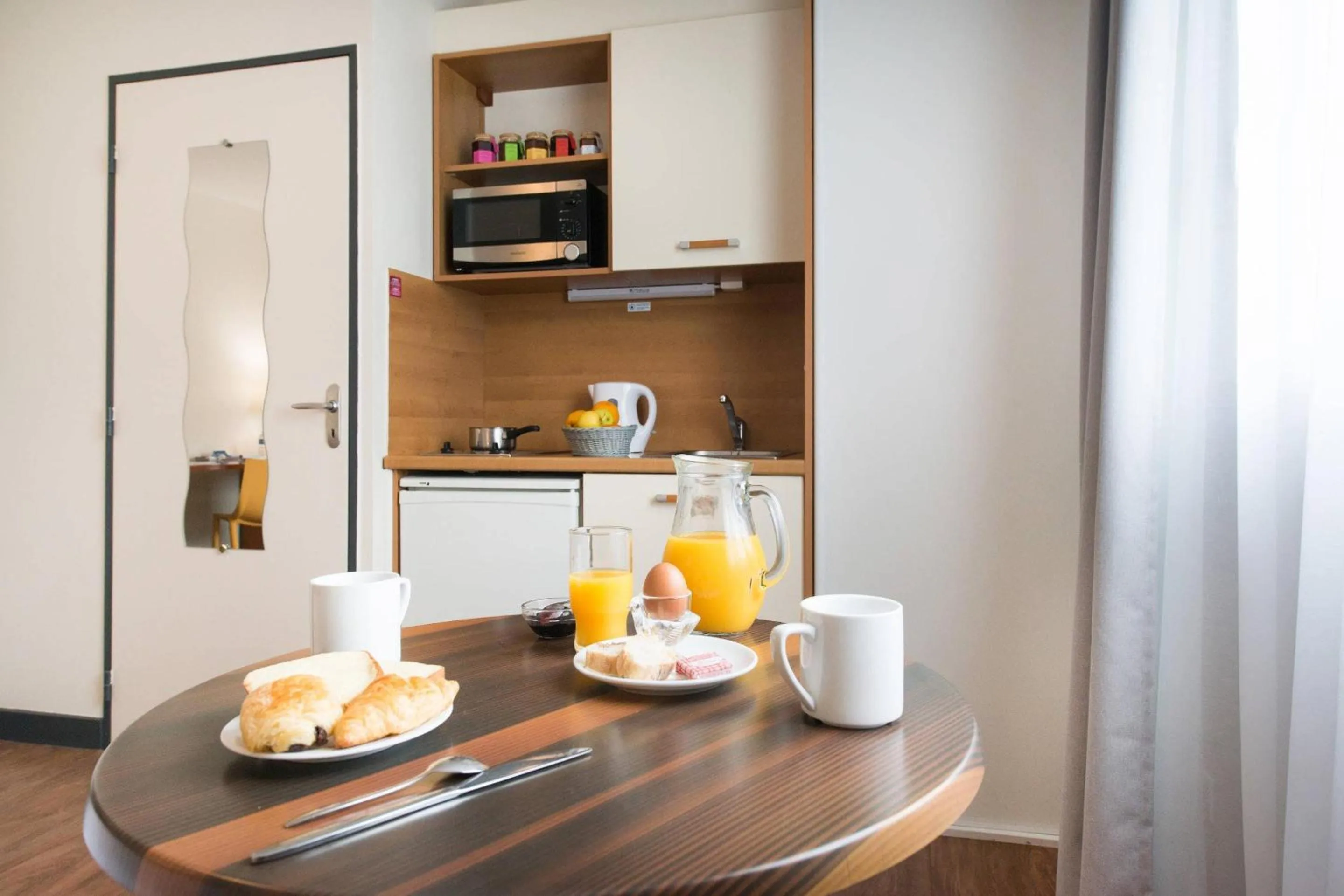 Bedroom in Comfort Aparthotel Saint-Nazaire Les Portes de l Ocean