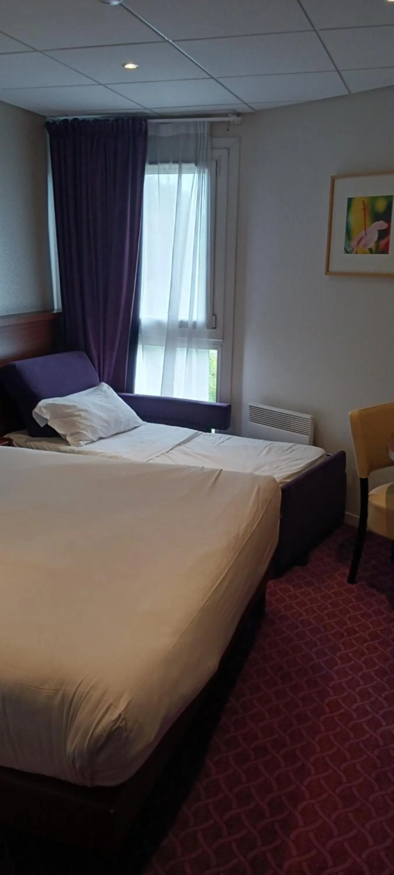 Bed in Brit Hotel Tours Sud – Le Cheops