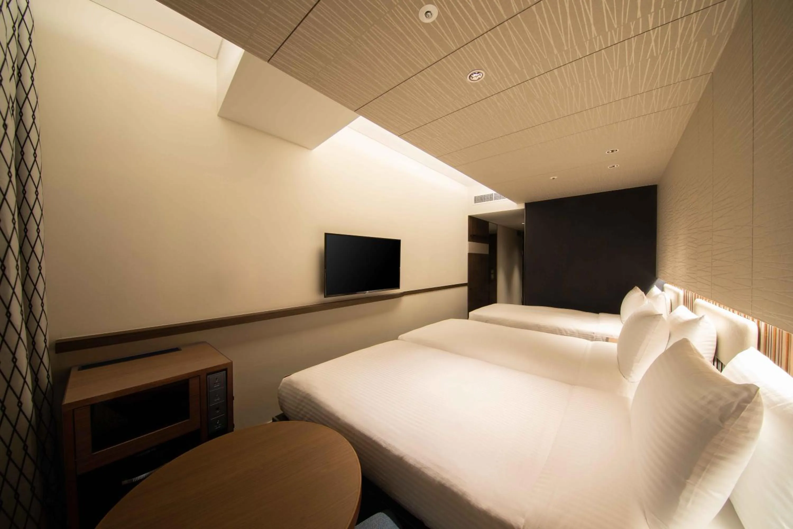 Photo of the whole room, Bed in Sotetsu Fresa Inn Seoul Myeong-dong