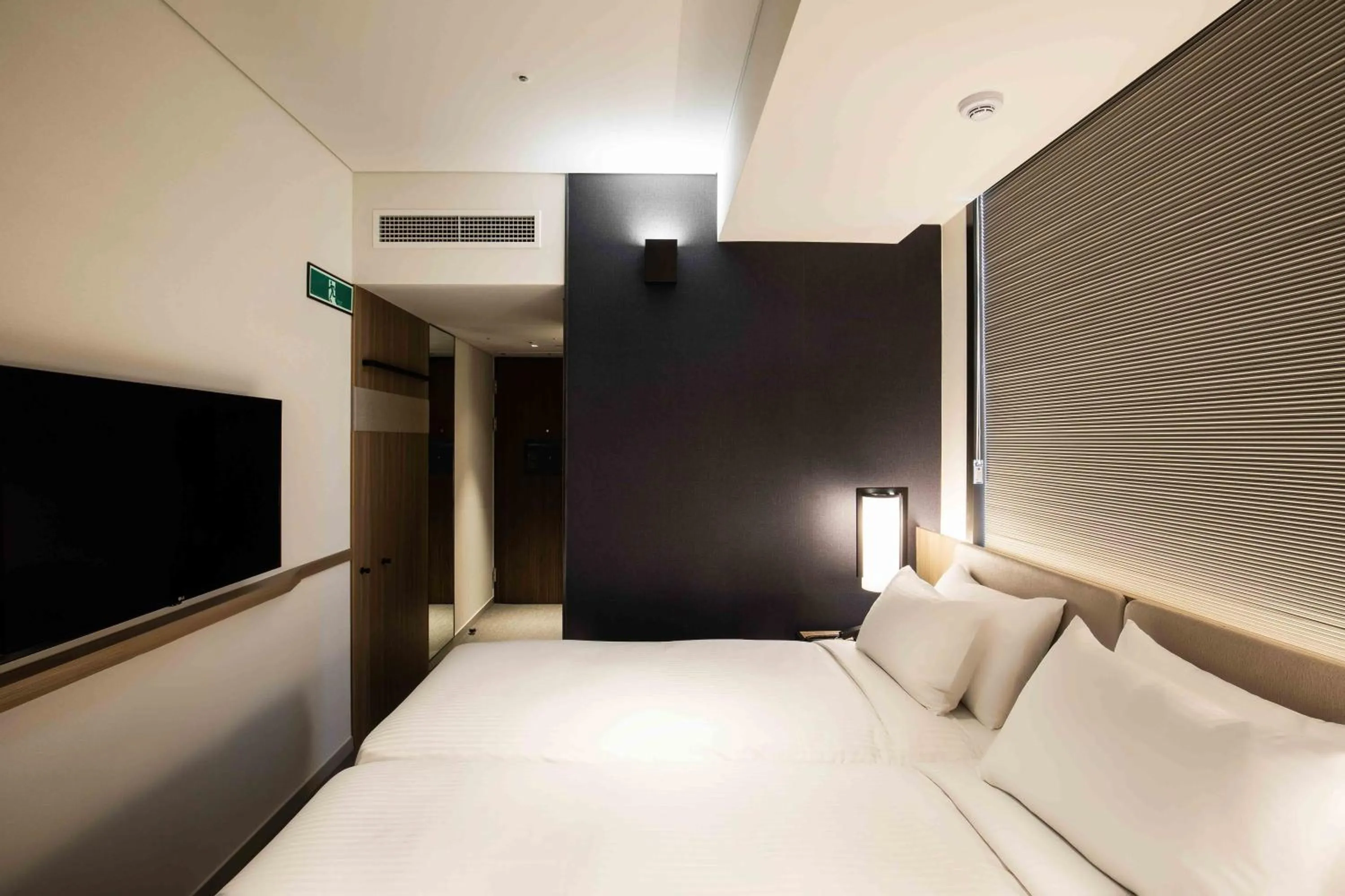 Photo of the whole room, Bed in Sotetsu Fresa Inn Seoul Myeong-dong