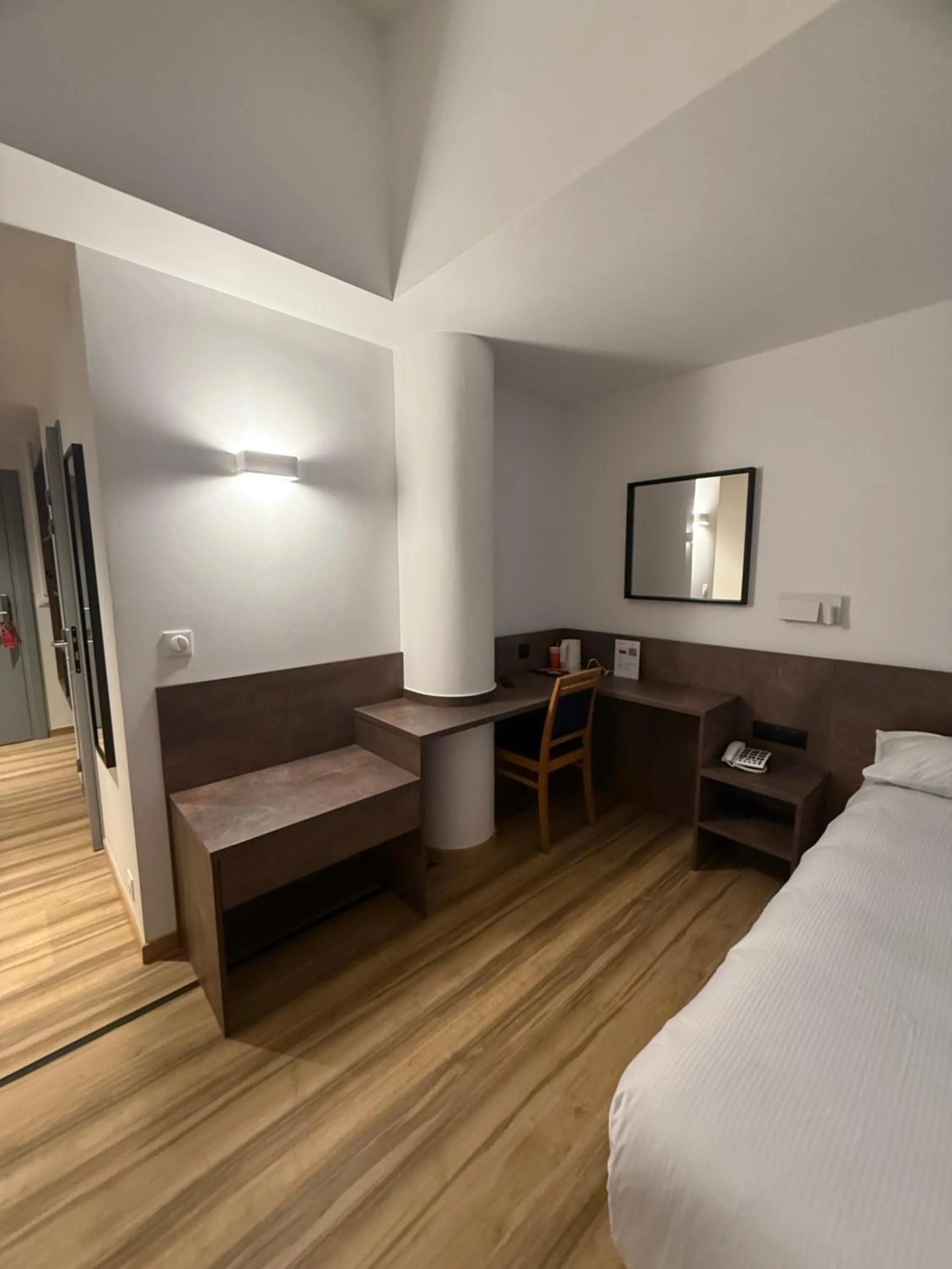 Bedroom, Bed in Hotel Strasbourg - Montagne Verte & Restaurant Louisiane