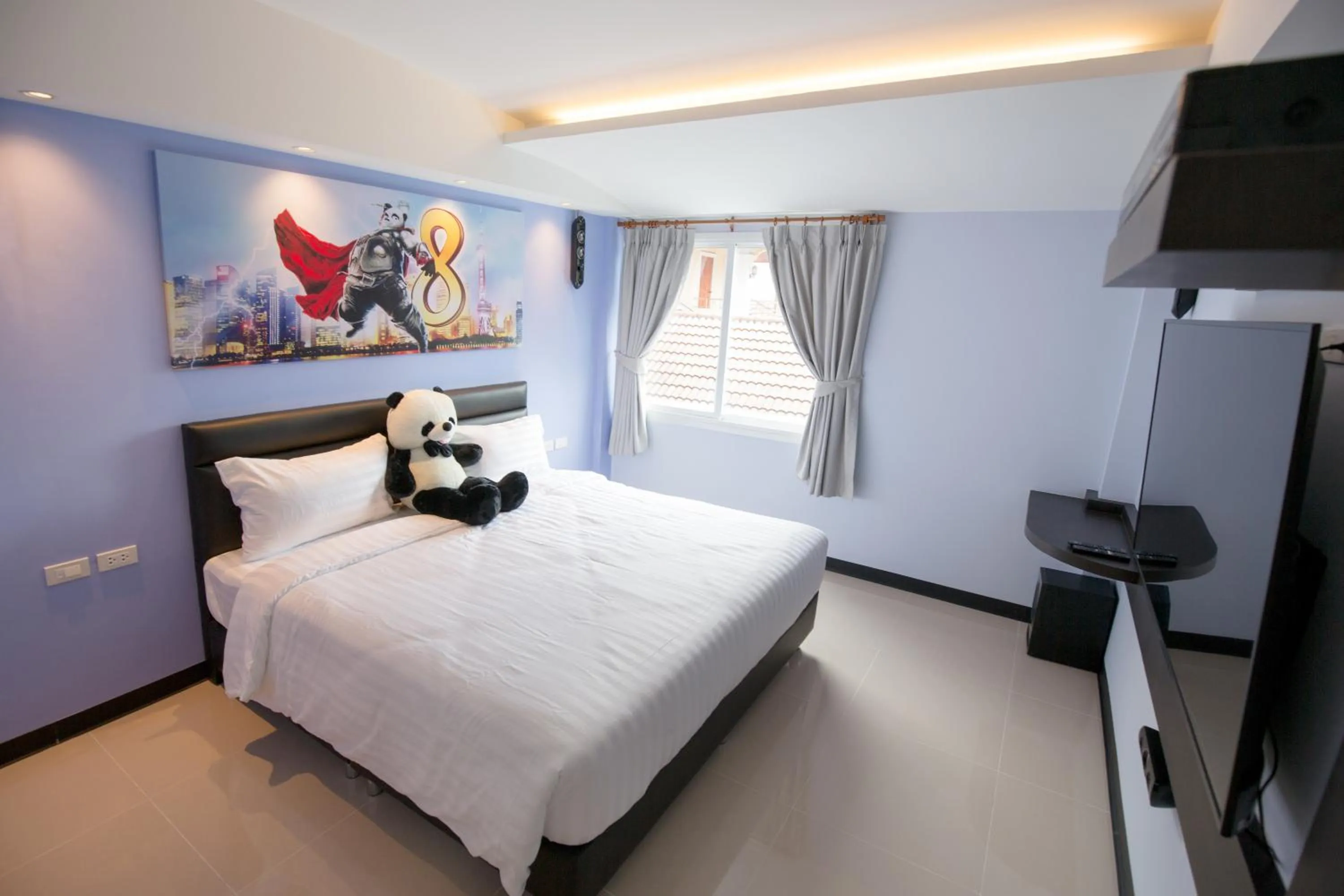 Bed in Lucky panda Hotel