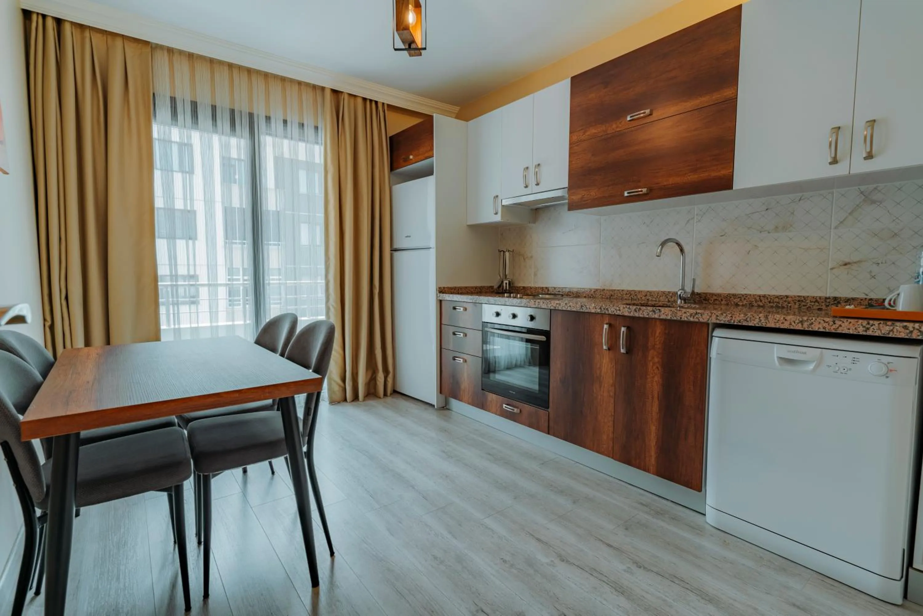 dishwasher in Empula Hotel & Residences