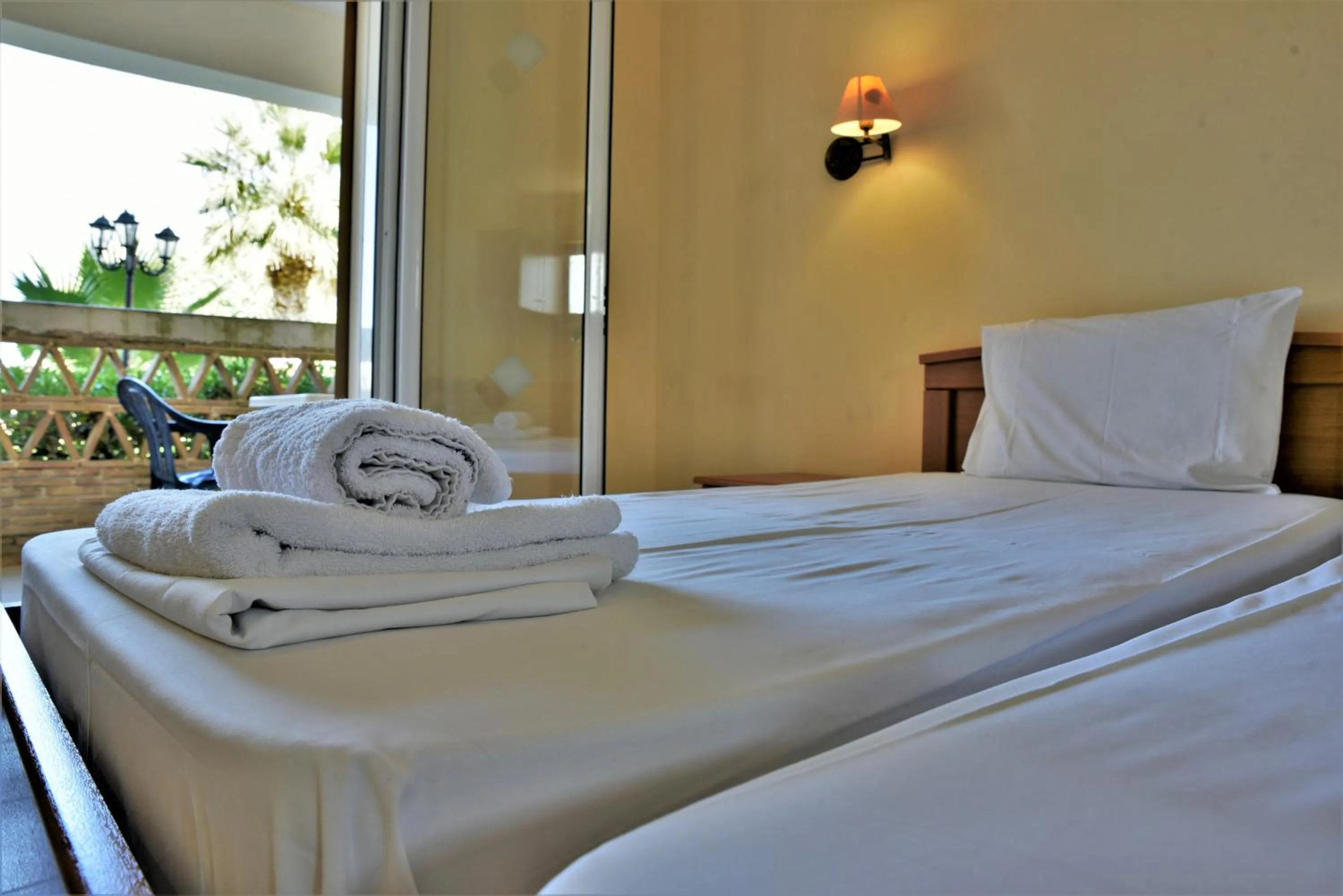Bed in Elpida Hotel