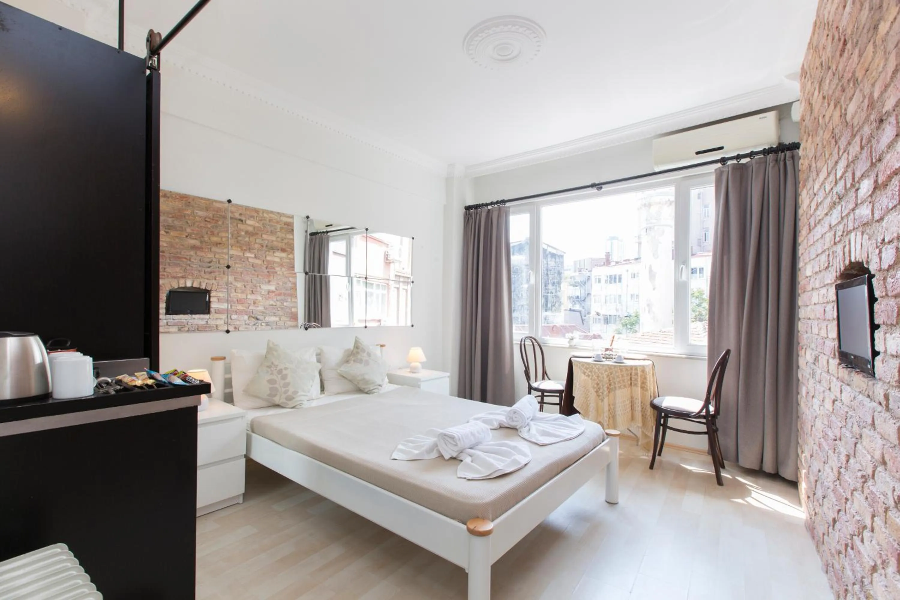 Photo of the whole room, Bed in Antique Boutique