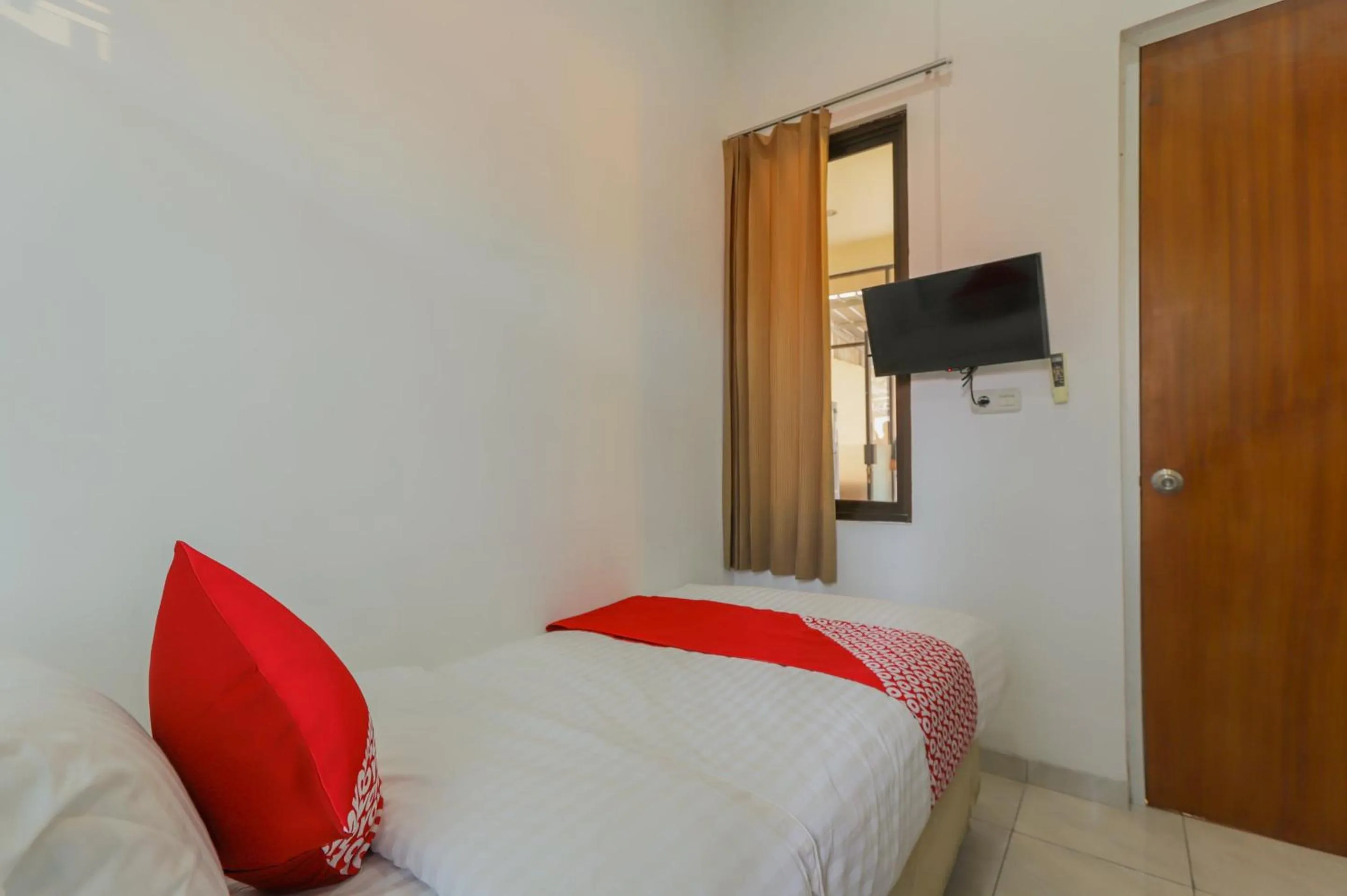 Bedroom, Bed in Hotel O Idola Residence