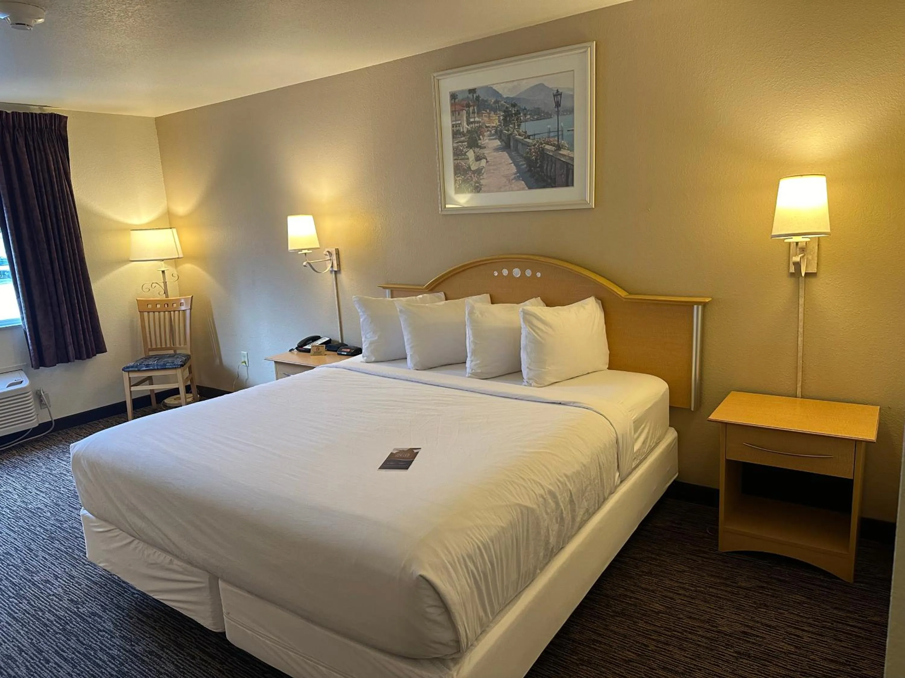 Bed in Baymont by Wyndham Lawrenceburg