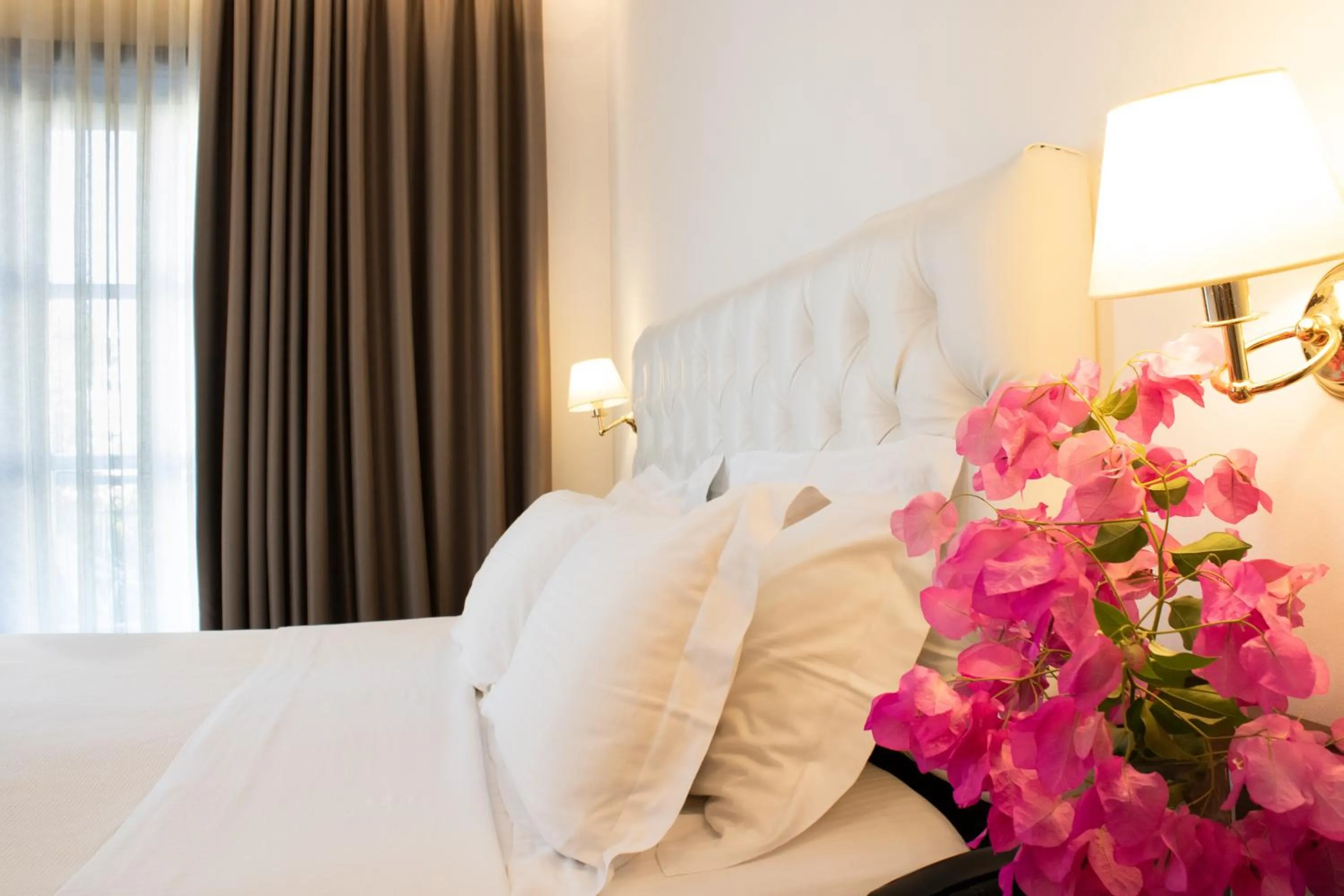 Bed in Armata Boutique Hotel