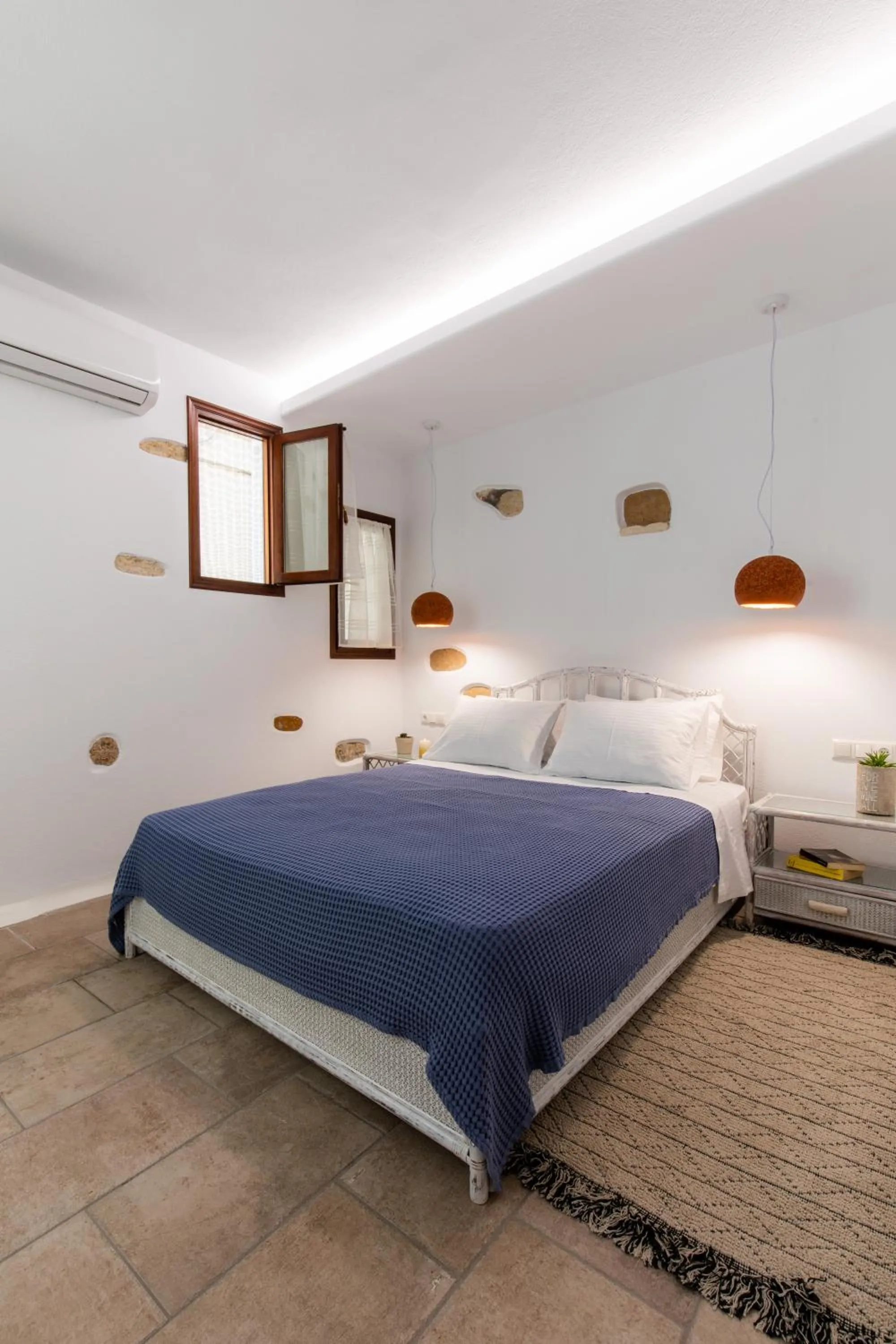 Bed in Arco Naxos Luxury Apartments