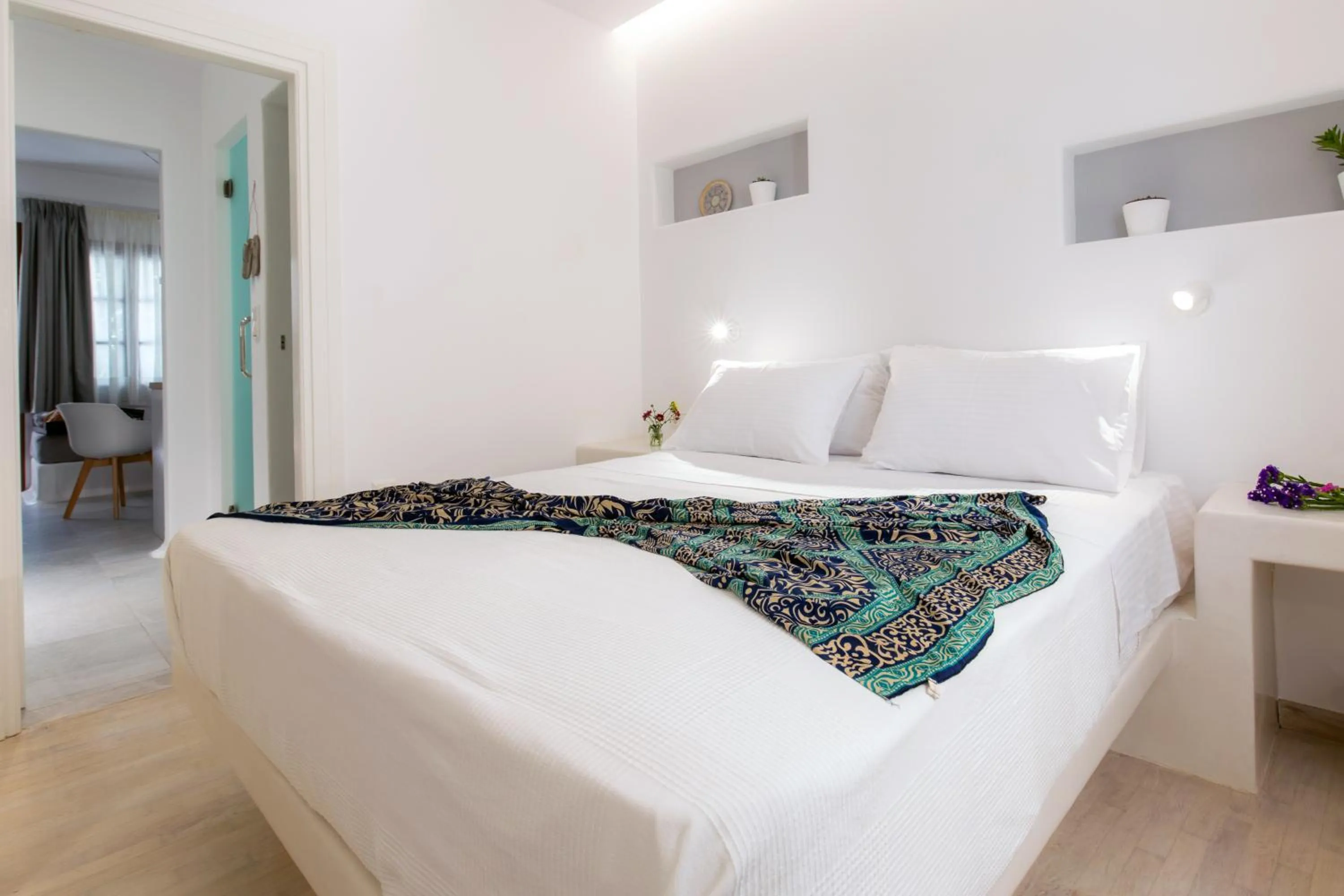Bed in Arco Naxos Luxury Apartments