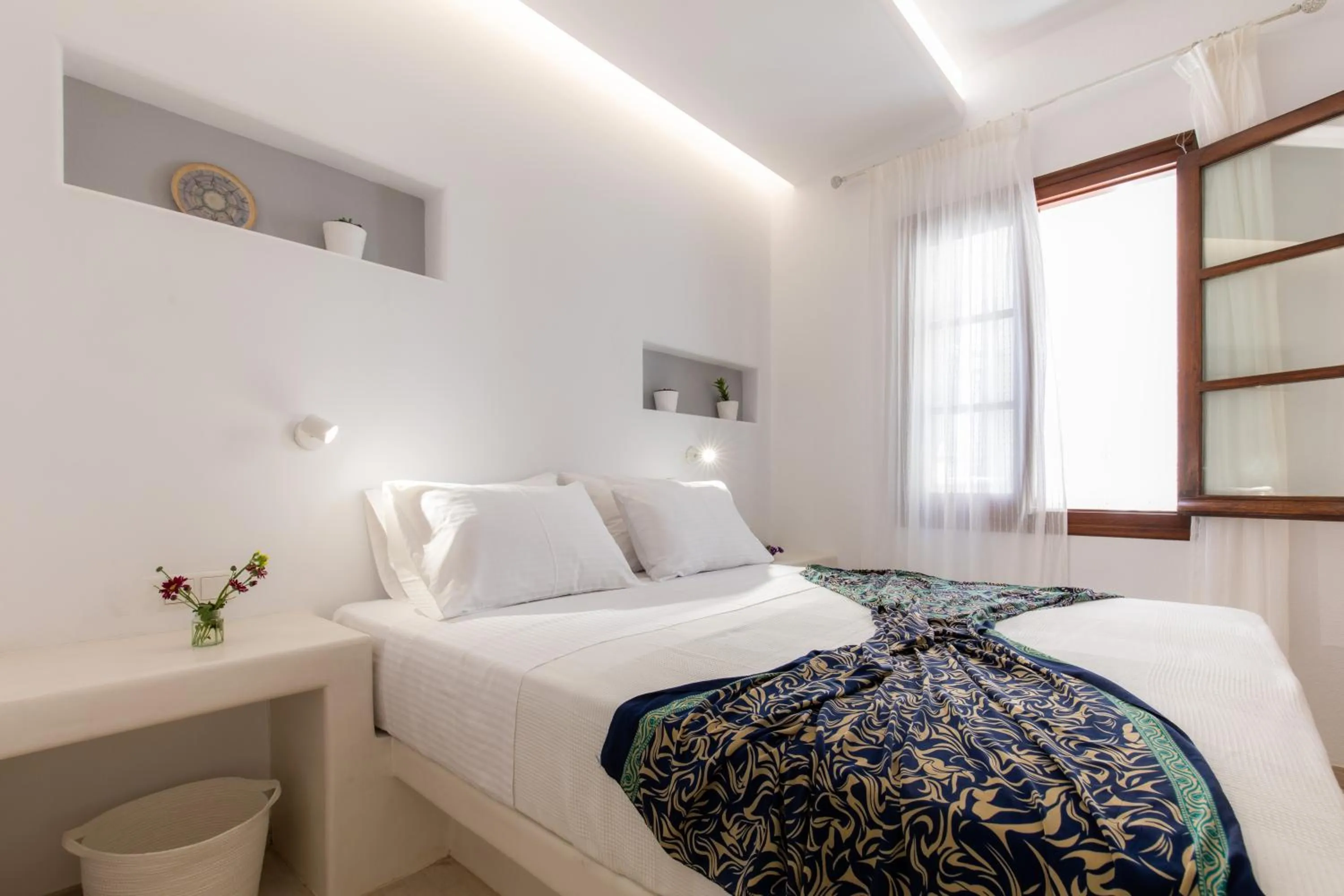 Bed in Arco Naxos Luxury Apartments