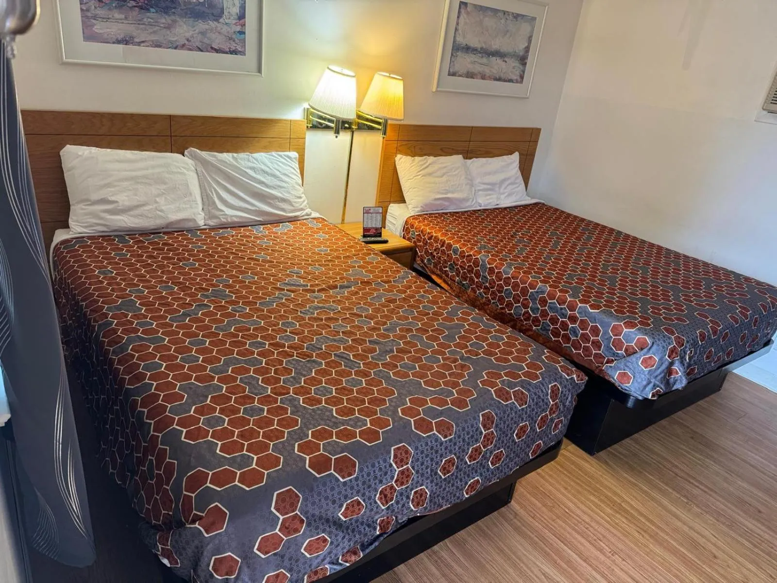 Bedroom, Bed in Economy Inn Cadillac MI by Hotel O