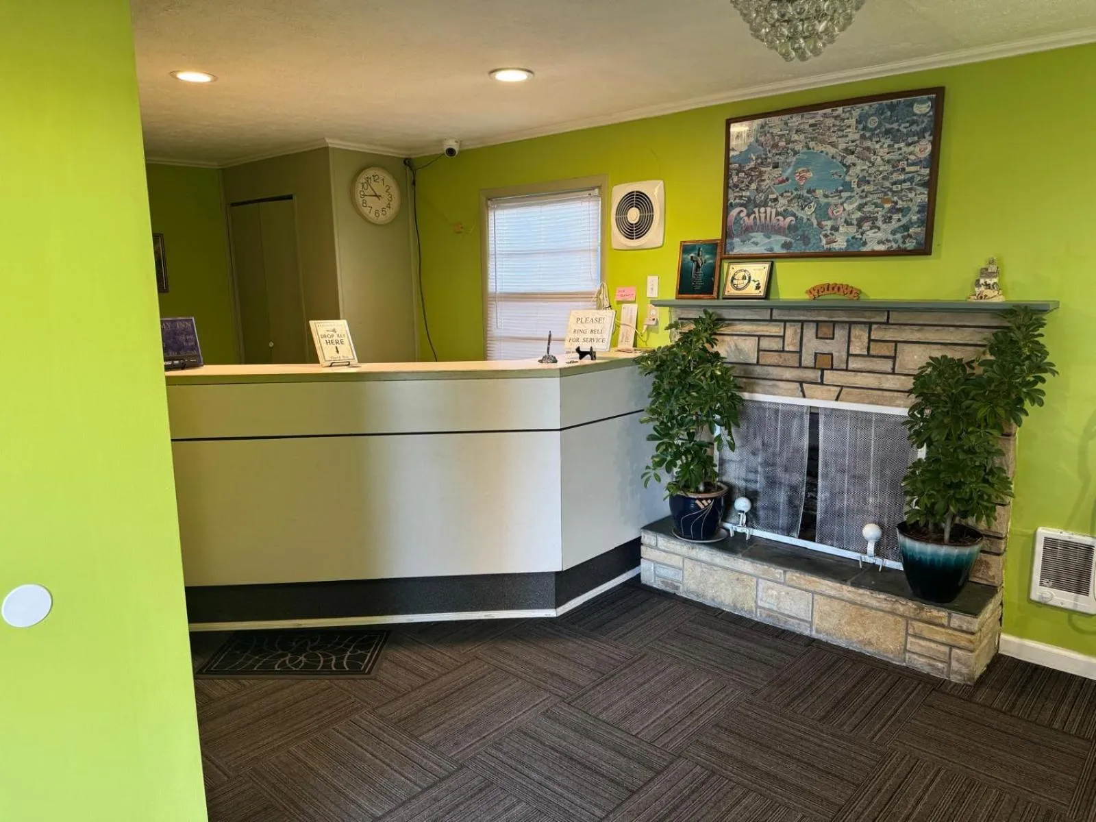 Lobby or reception in Economy Inn Cadillac MI by Hotel O