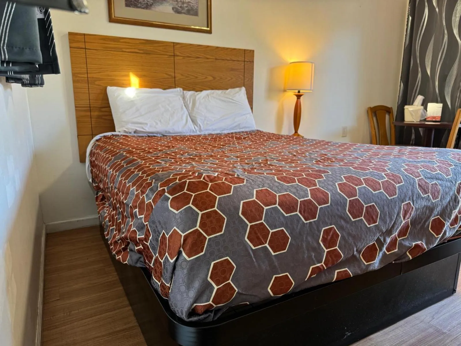 Bedroom, Bed in Economy Inn Cadillac MI by Hotel O