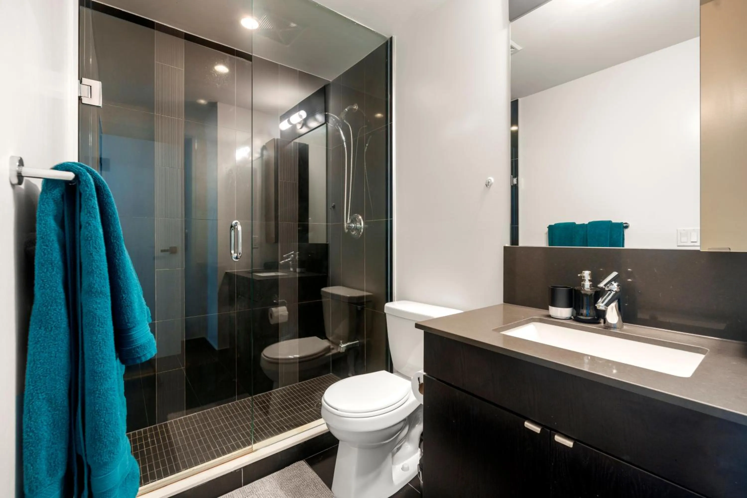 Shower in Modern Lillian St Apartments by GLOBALSTAY