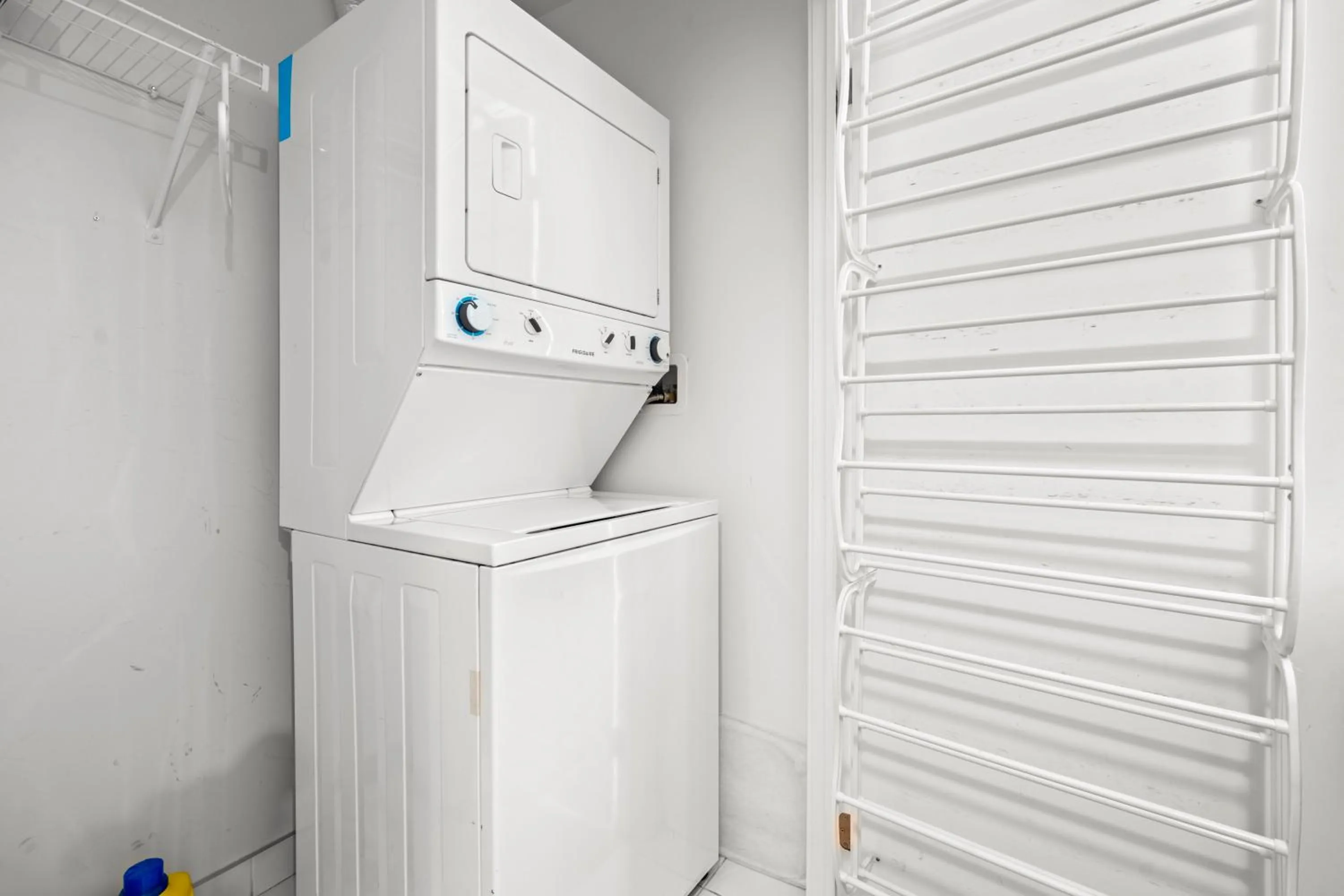 washing machine in Modern Lillian St Apartments by GLOBALSTAY