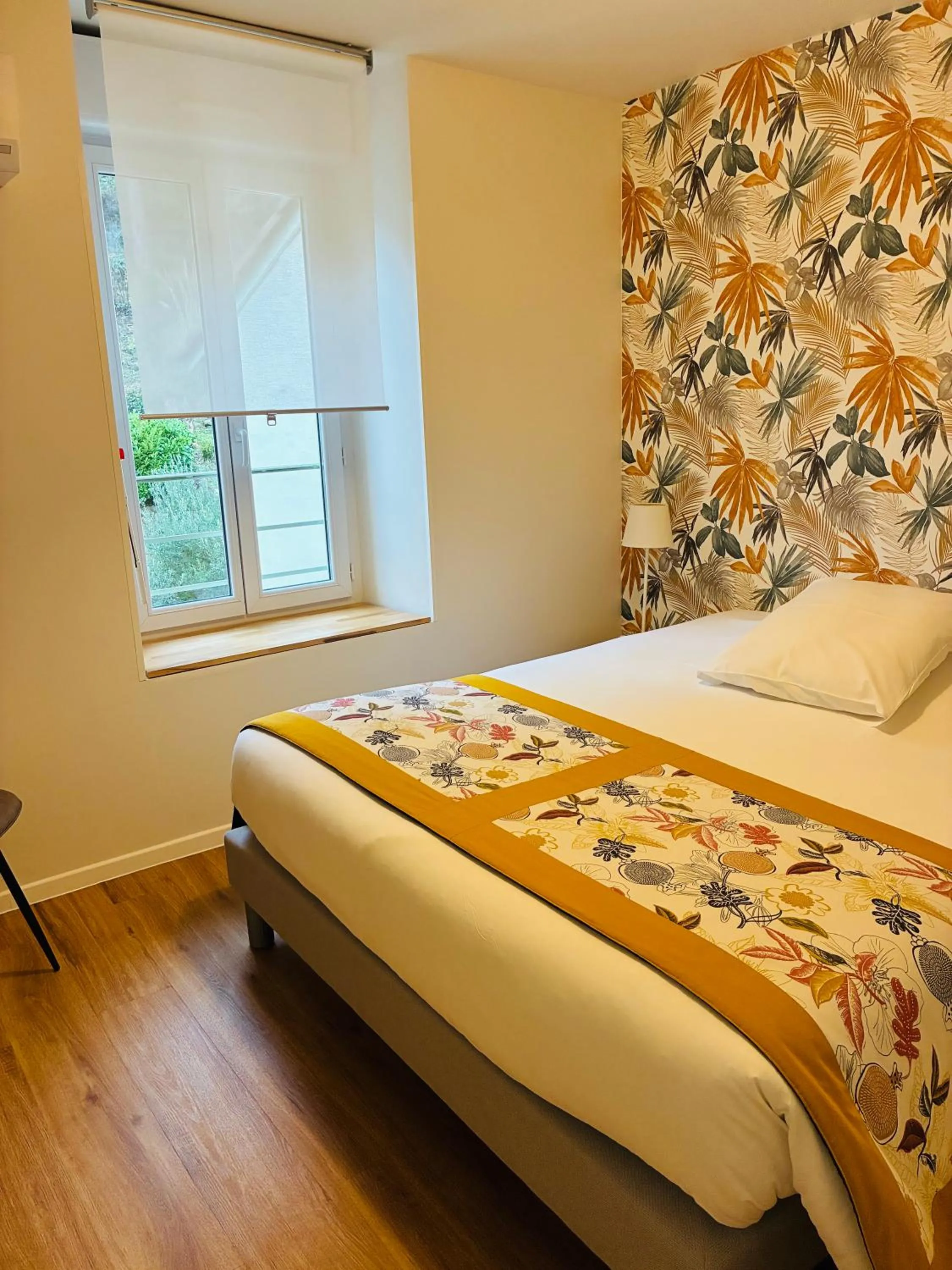 Bed in Hotel De Ma Tante