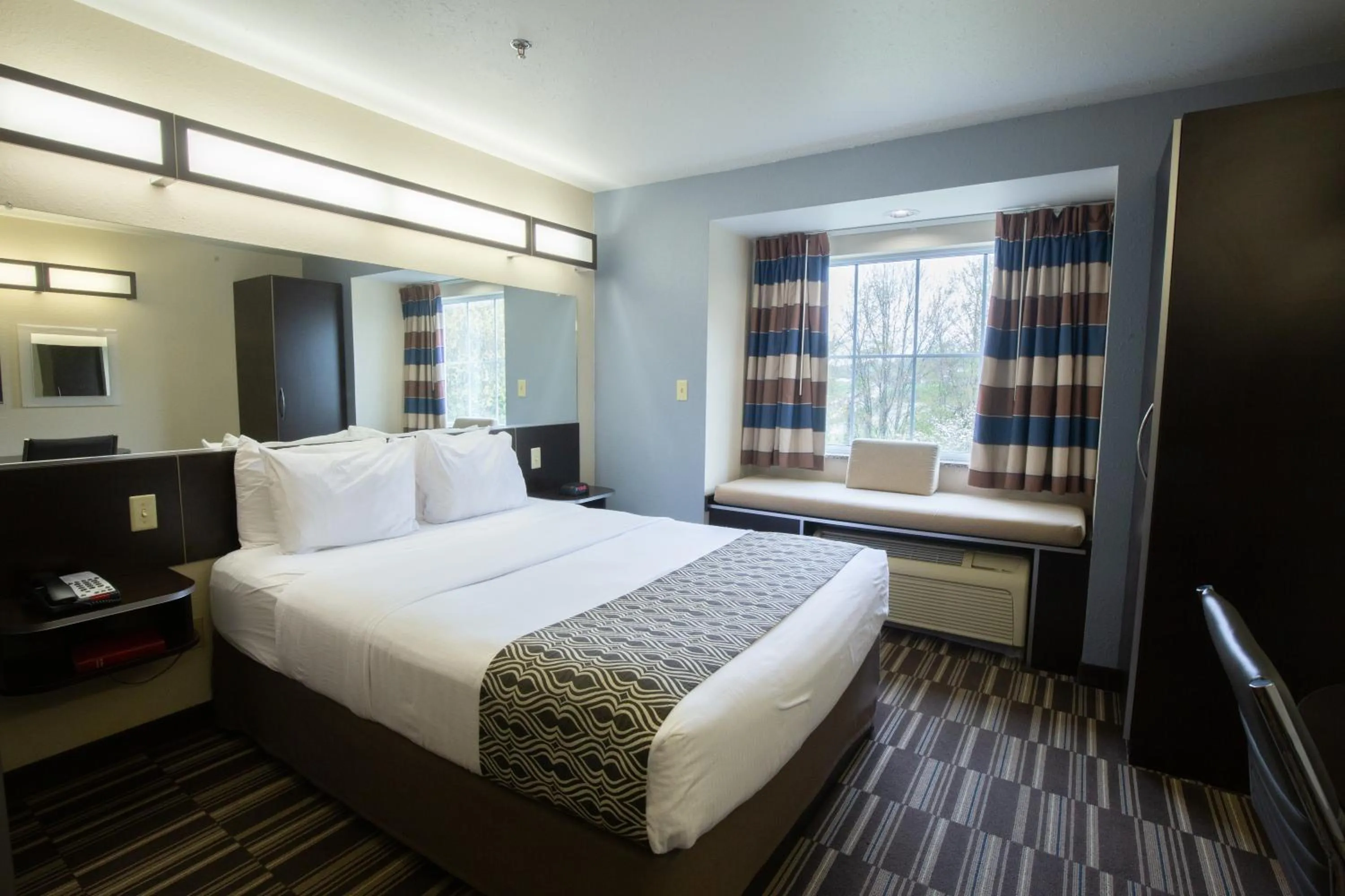 Bed in Microtel Inn & Suites by Wyndham Waynesburg