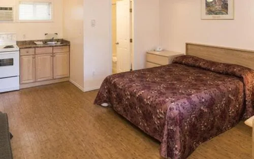 Bed in Beachside Motel