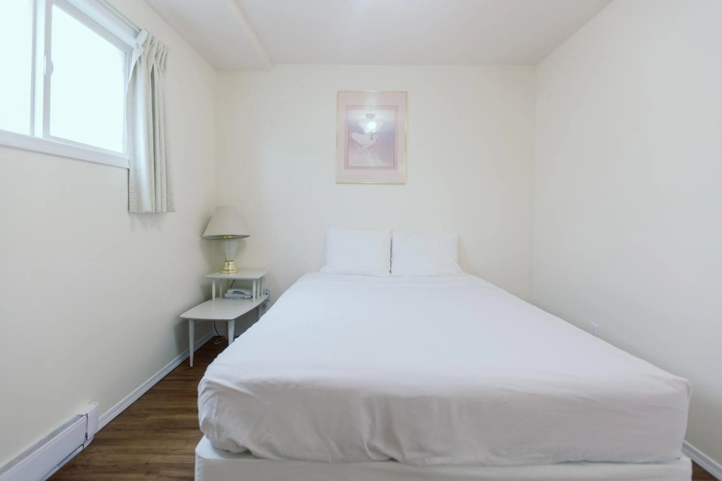 Bed in Beachside Motel