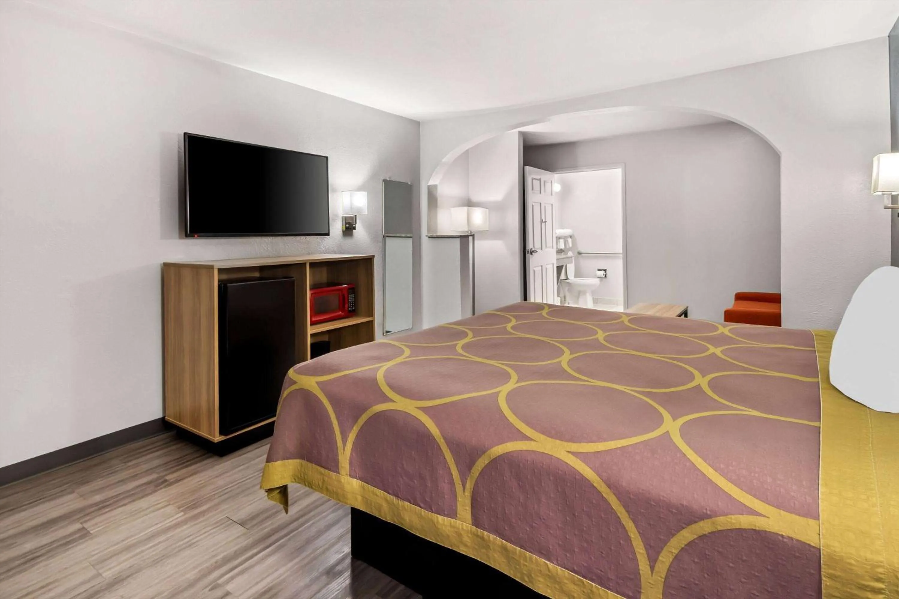 Bed in Super 8 by Wyndham Grand Prairie Southwest