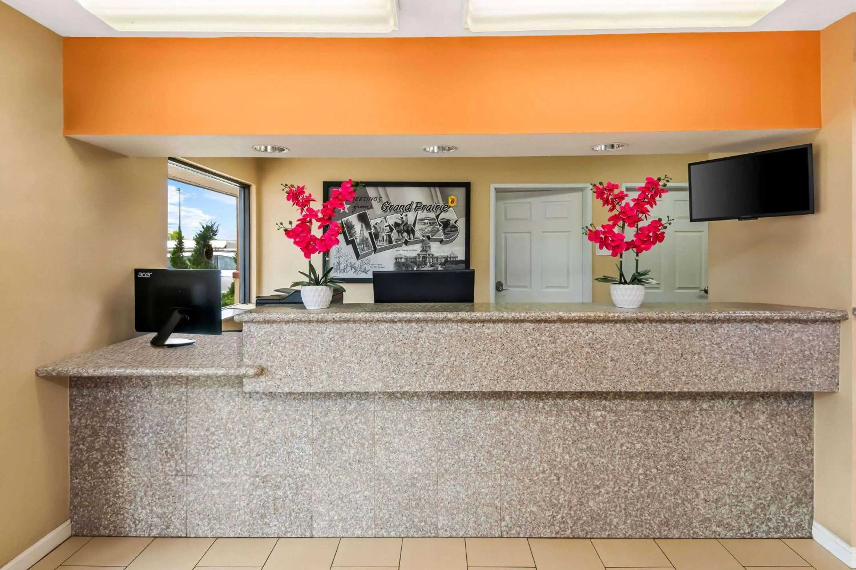 Lobby or reception in Super 8 by Wyndham Grand Prairie Southwest