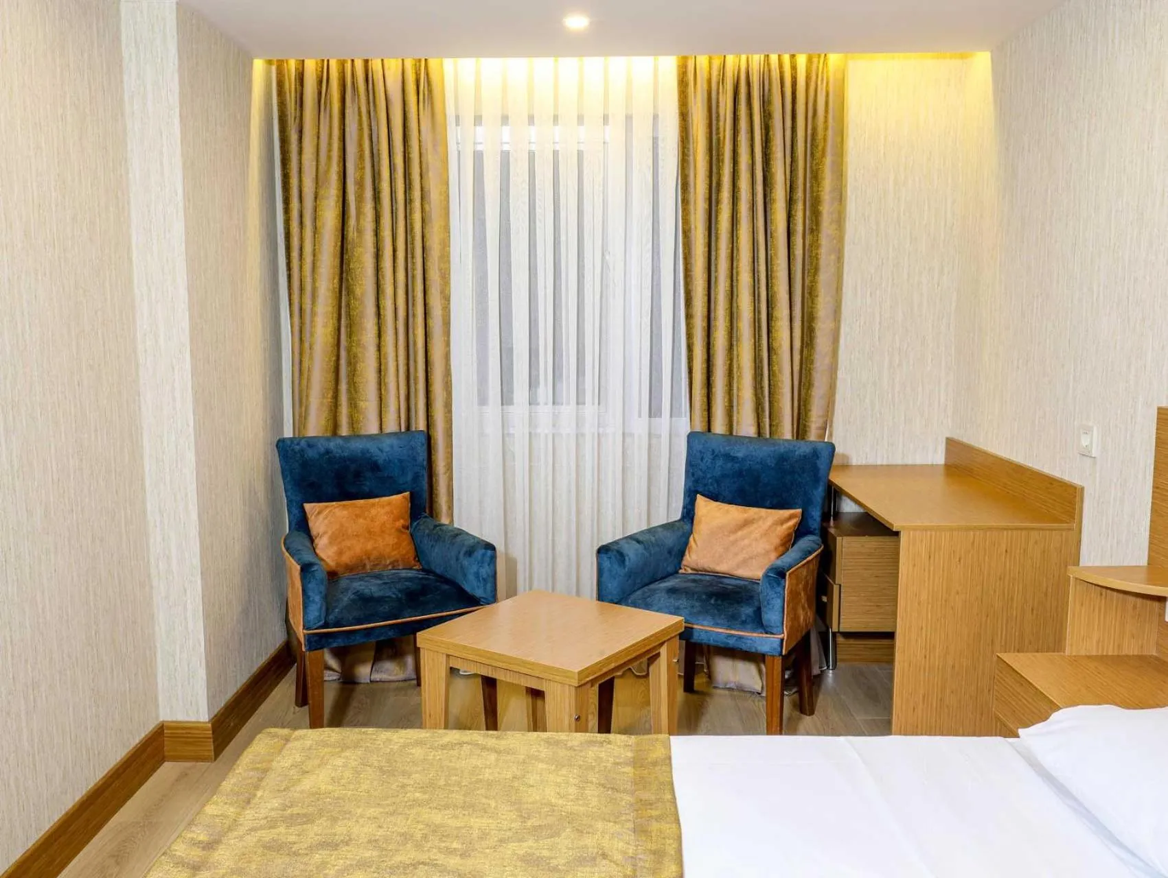 Seating area in Grand Elmira Suites