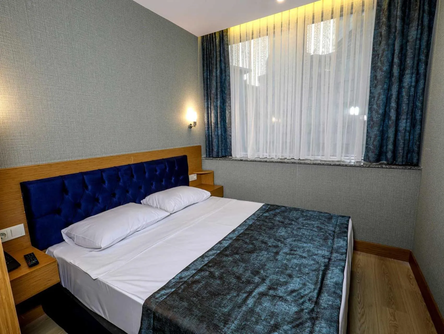 Bedroom in Grand Elmira Suites