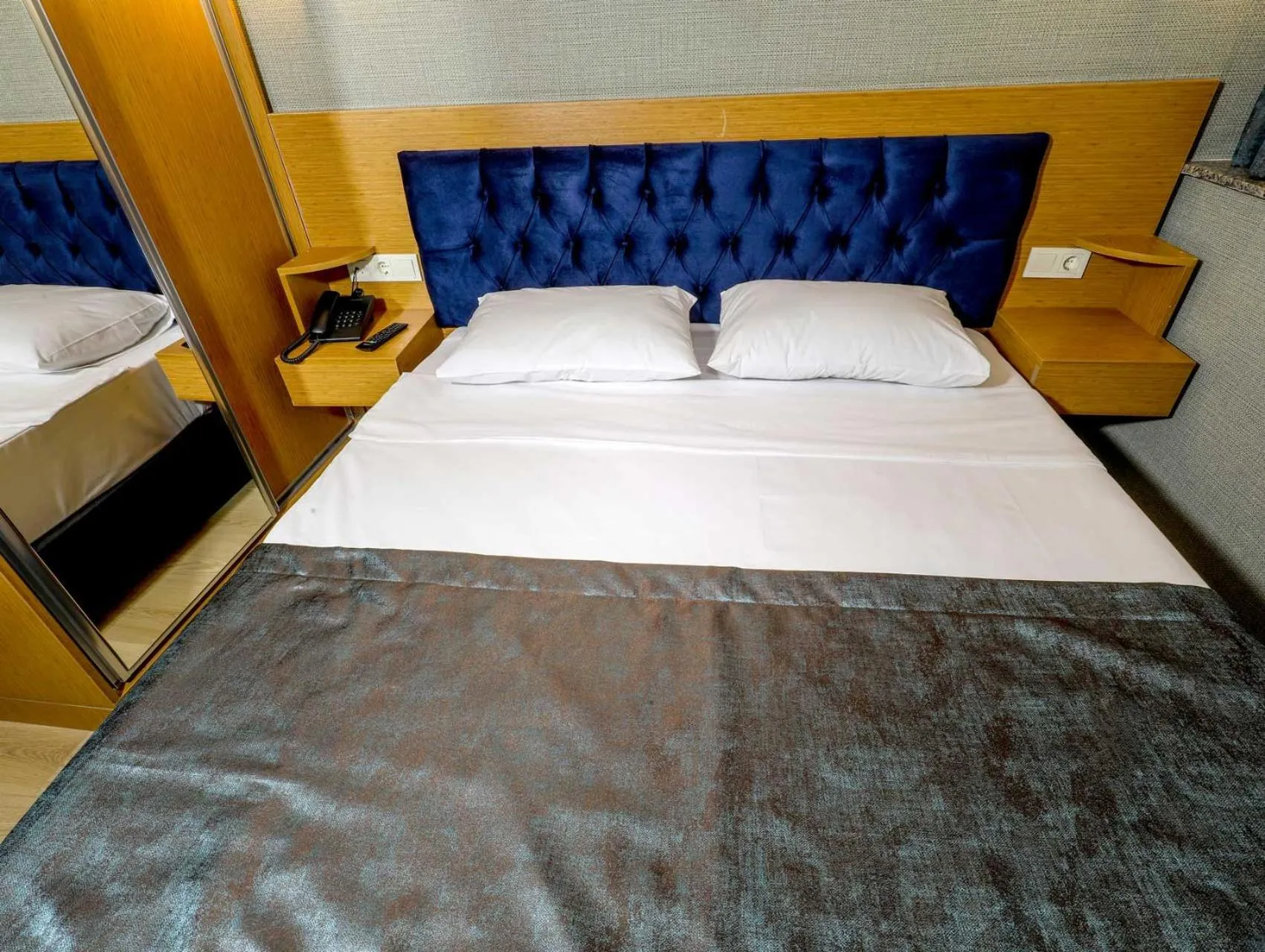 Bedroom in Grand Elmira Suites