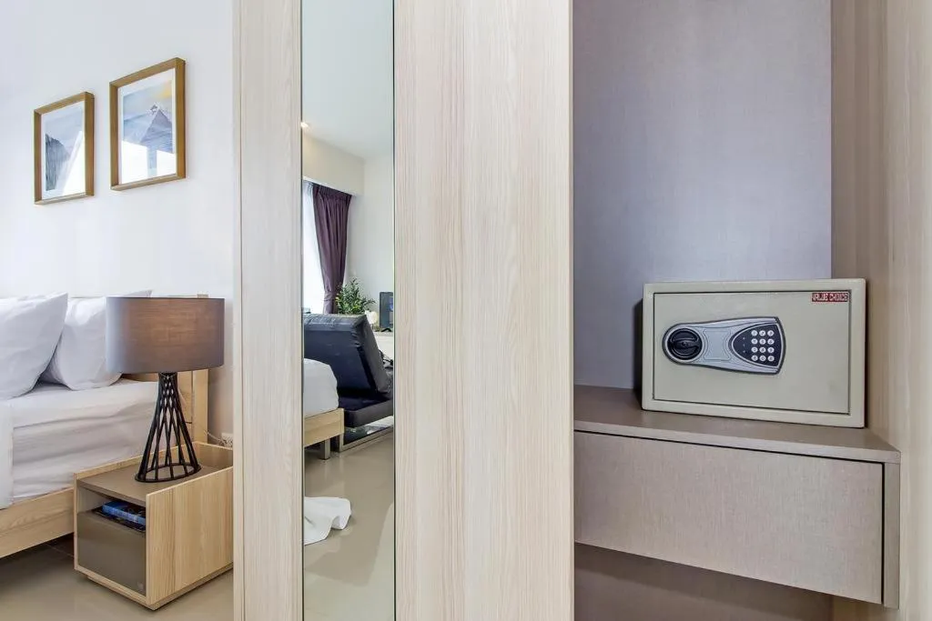 safe, Bed in Chic Condo by RESAVA