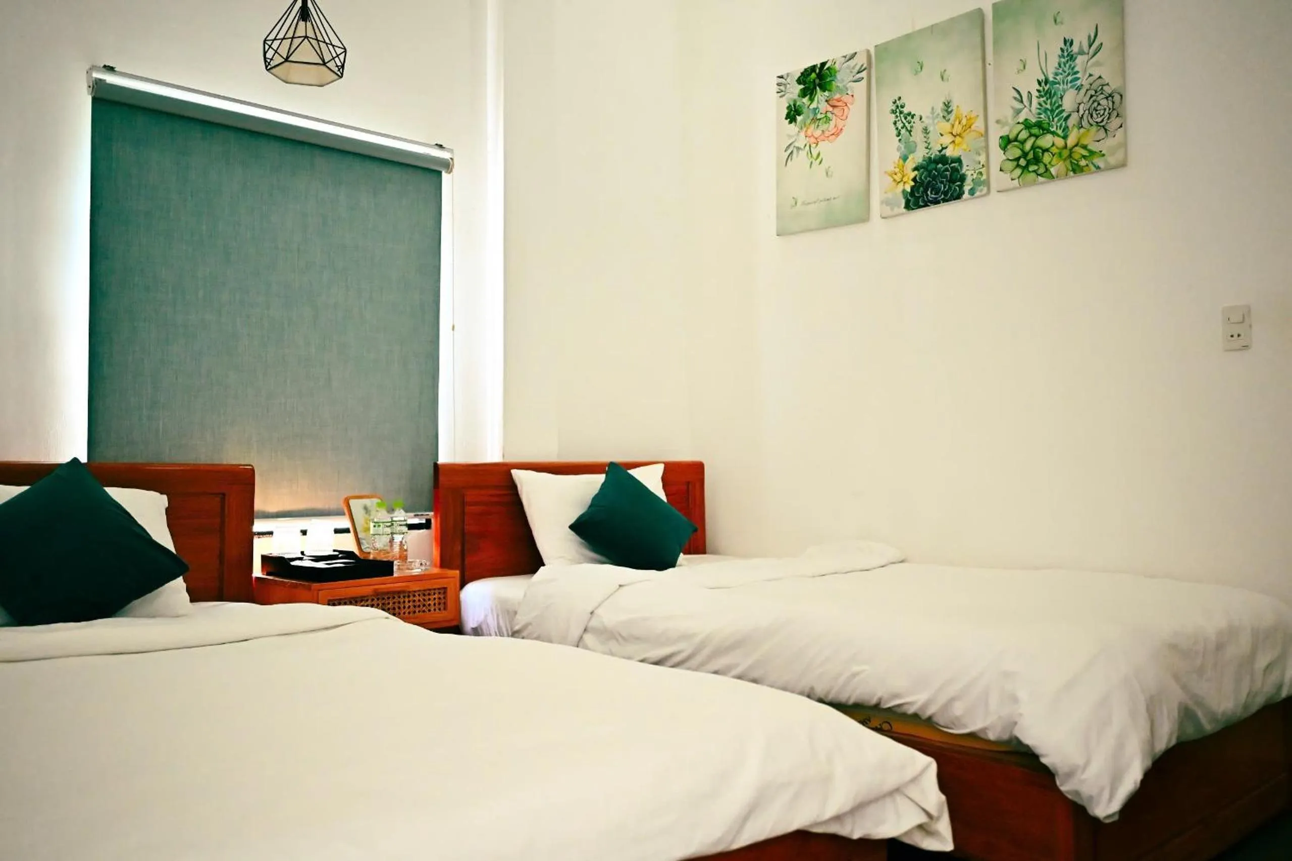 Bed in D'Villa Hotel - Homestay