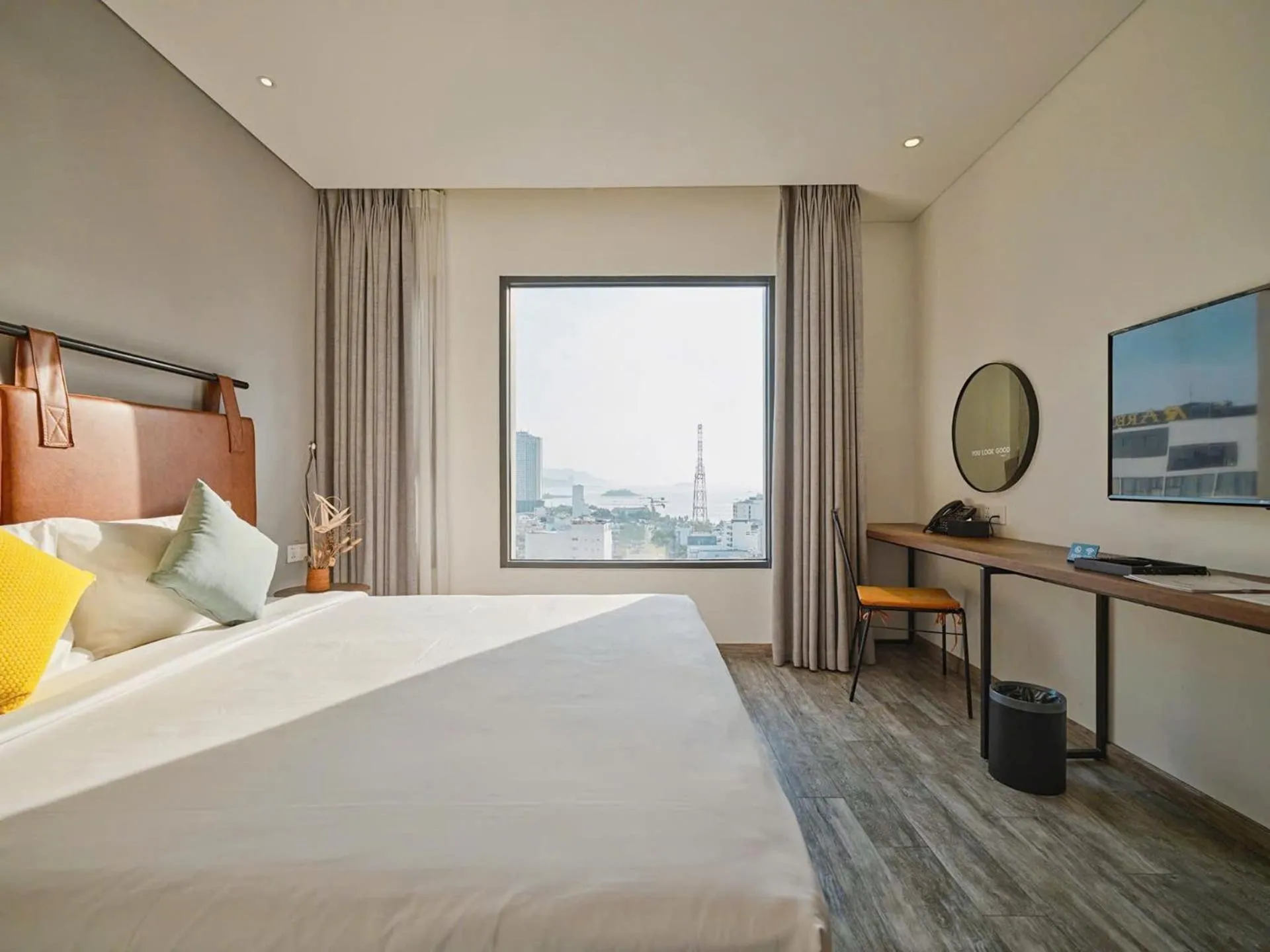 Bed in Em Oi Boutique Hotel