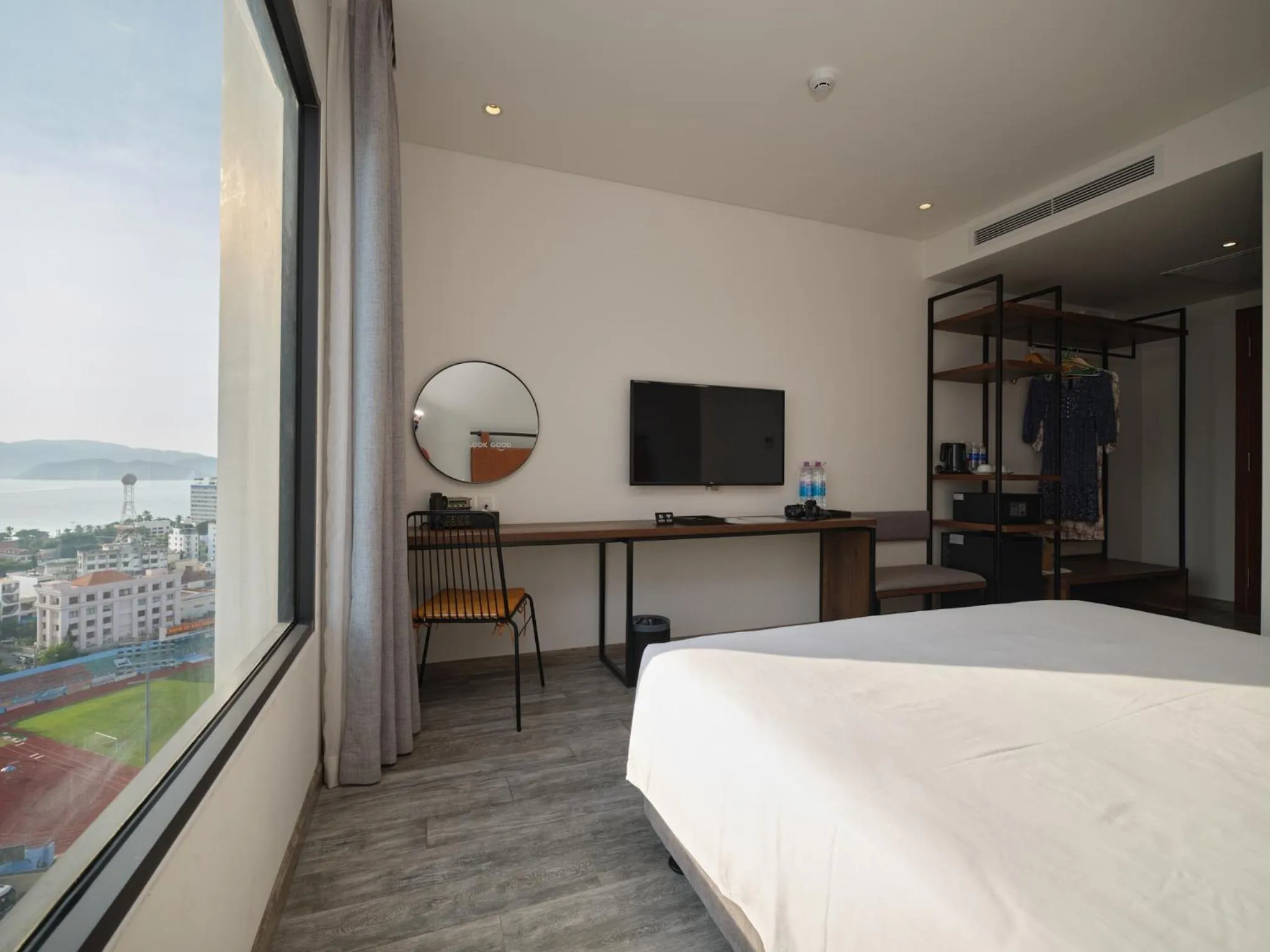 Bed in Em Oi Boutique Hotel