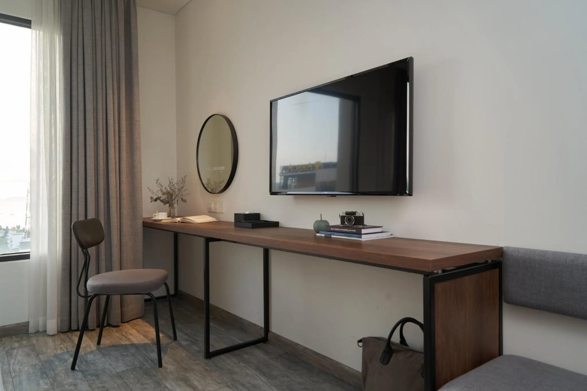 TV and multimedia in Em Oi Boutique Hotel