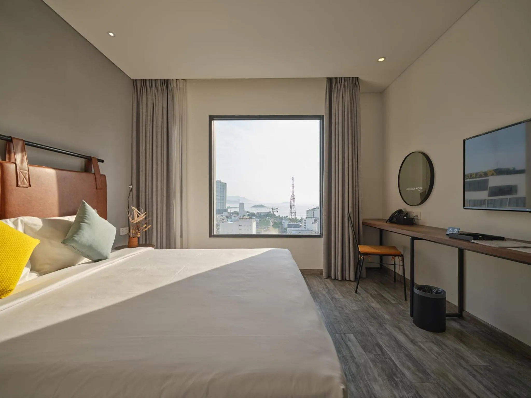 Bed in Em Oi Boutique Hotel