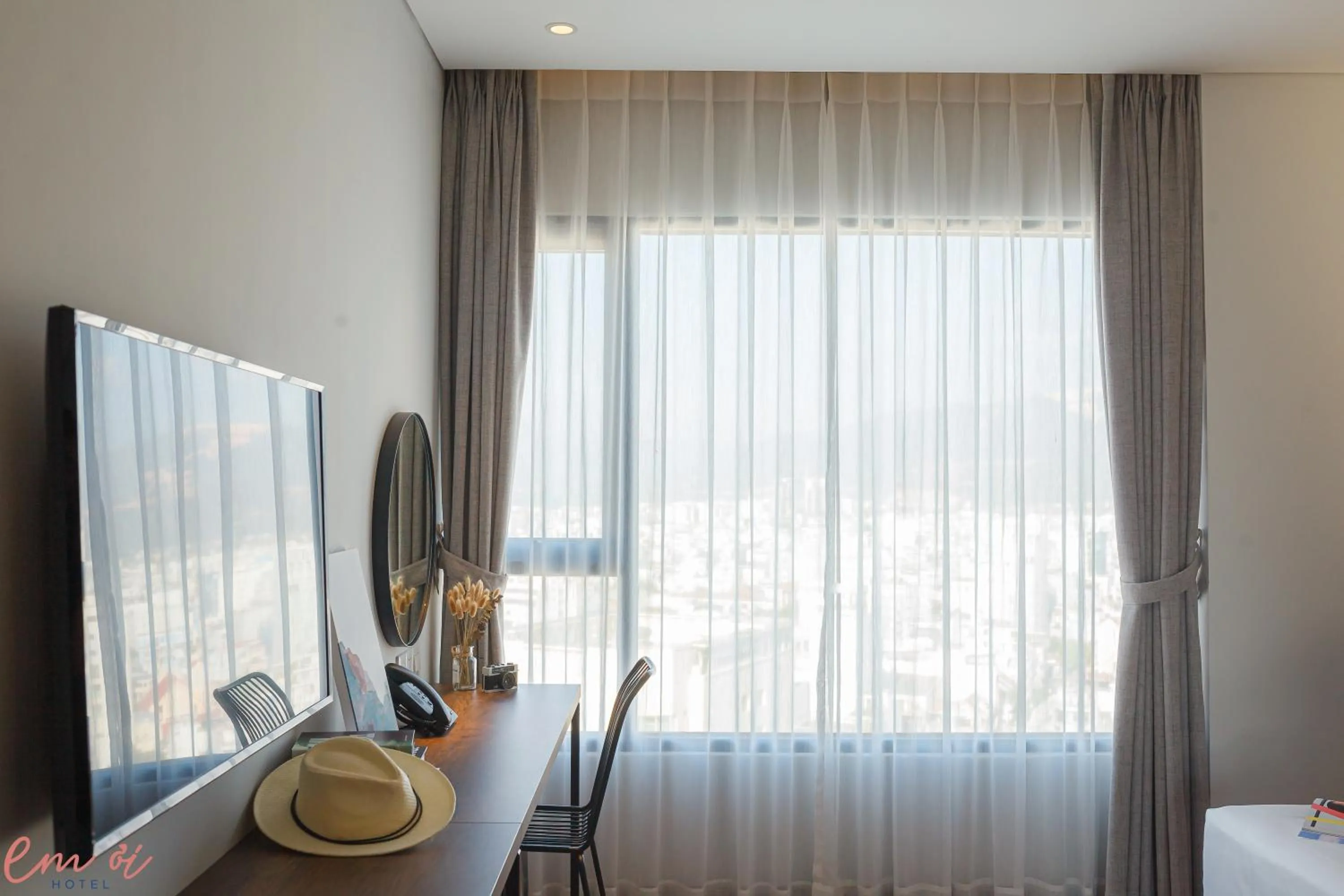 TV and multimedia in Em Oi Boutique Hotel