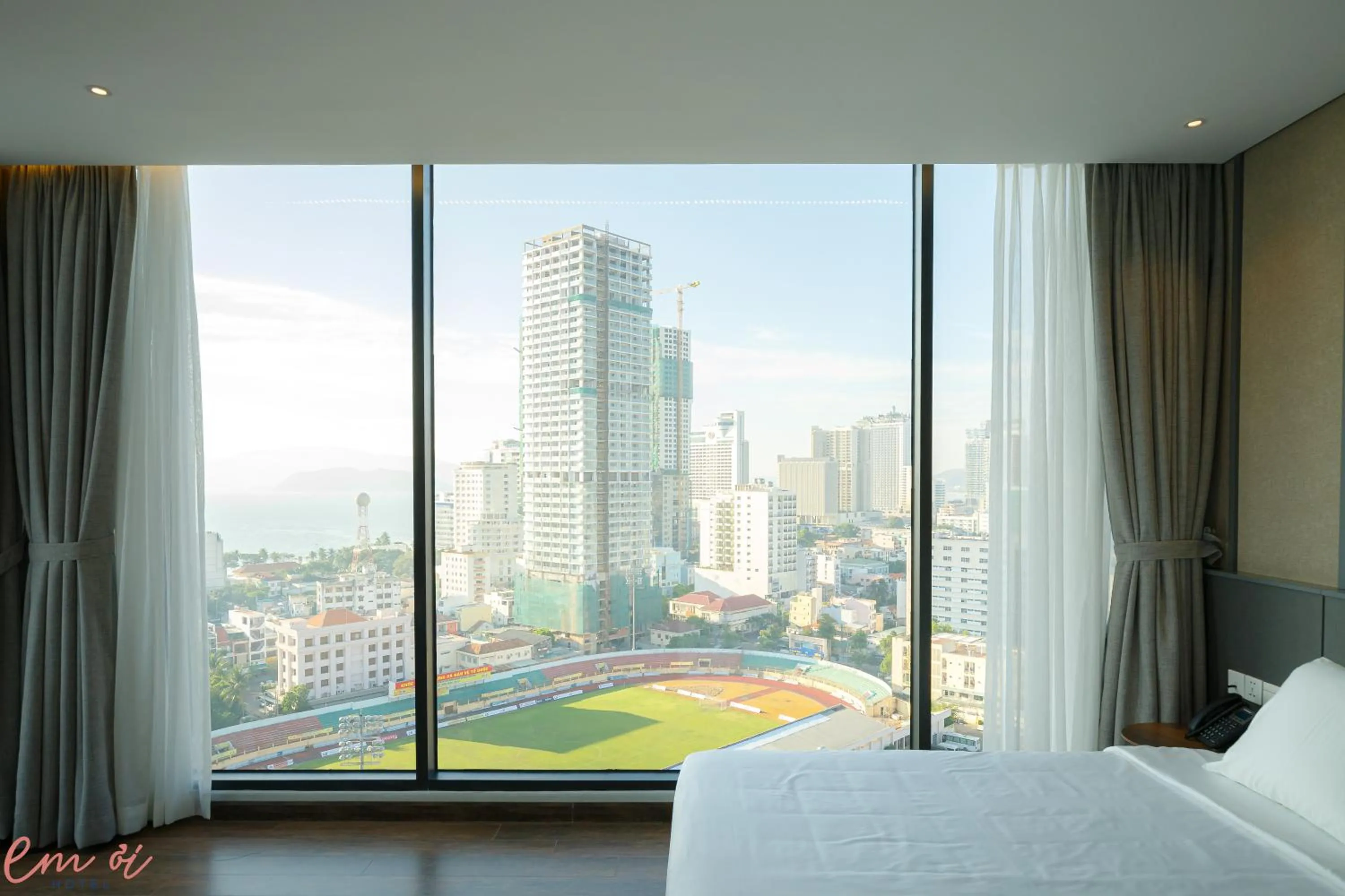 Bed in Em Oi Boutique Hotel