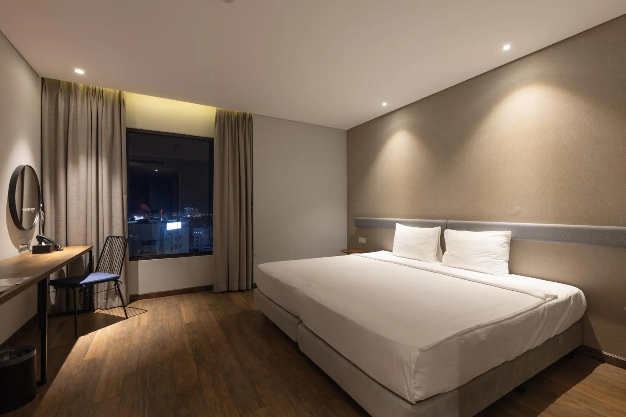 Bed in Em Oi Boutique Hotel