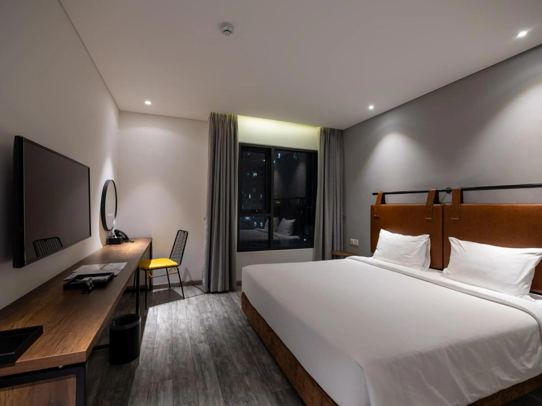 Bed in Em Oi Boutique Hotel