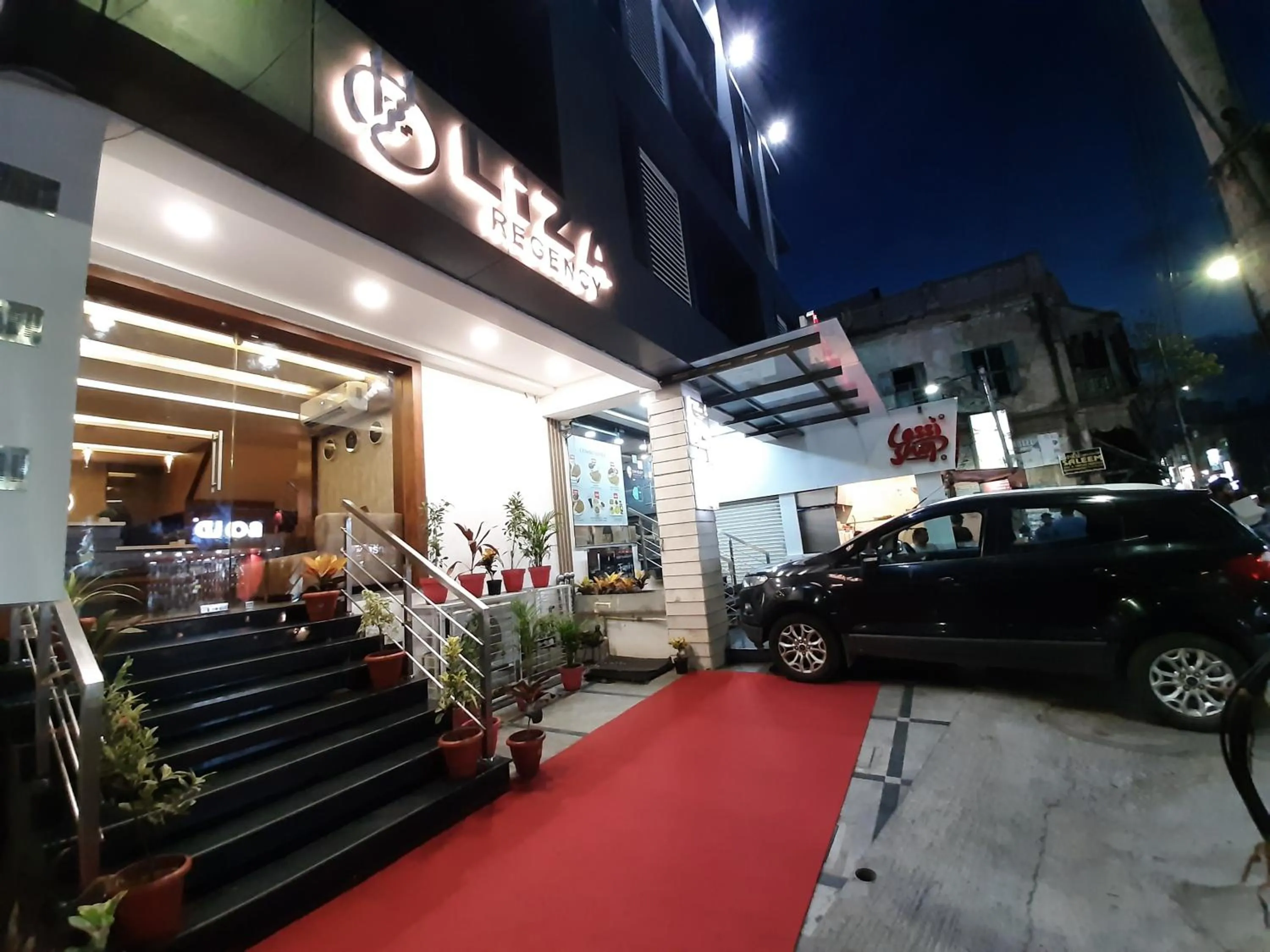 Property logo or sign in Liza Regency