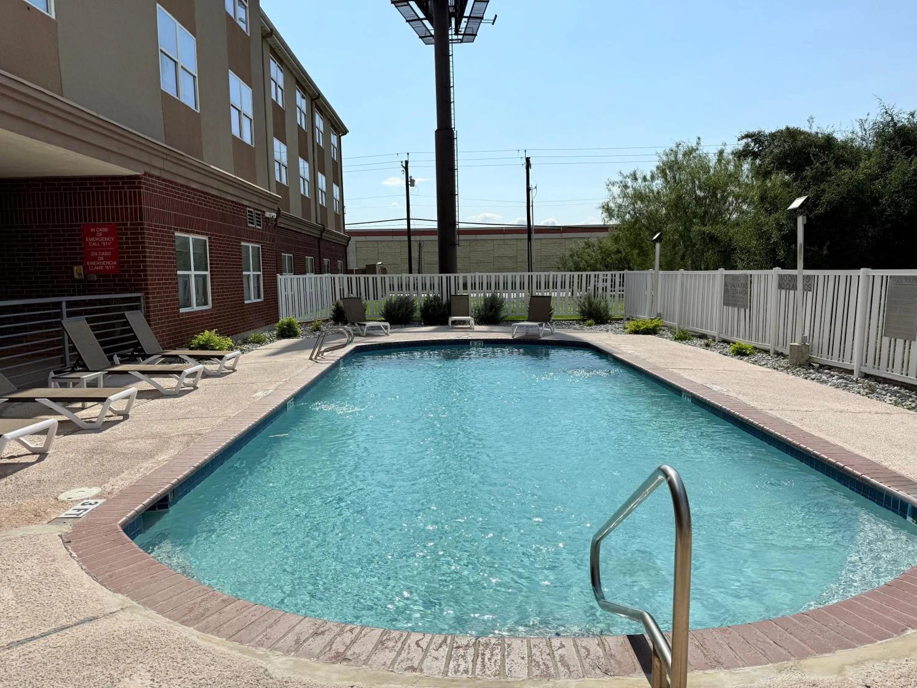 Swimming pool in Country Inn & Suites by Radisson, Harlingen, TX