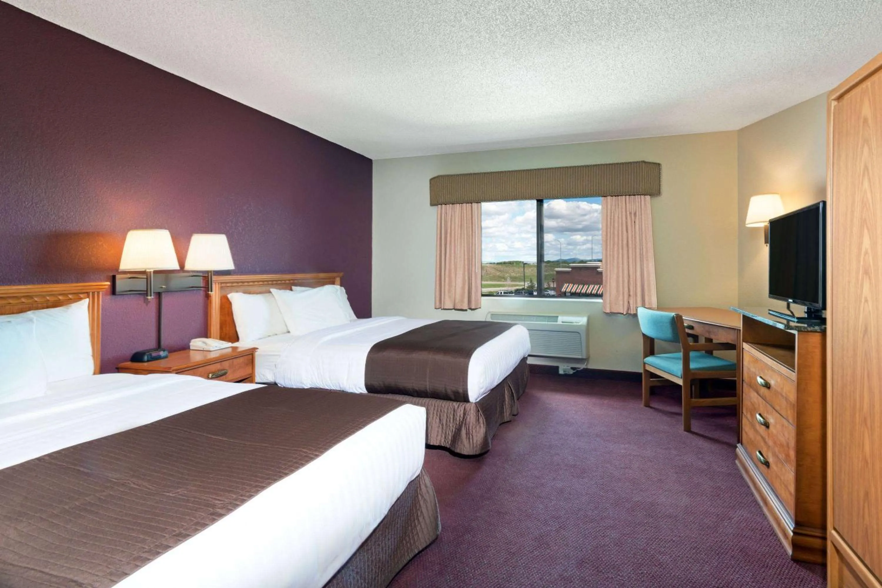 Photo of the whole room, Bed in AmericInn by Wyndham Rexburg BYUI