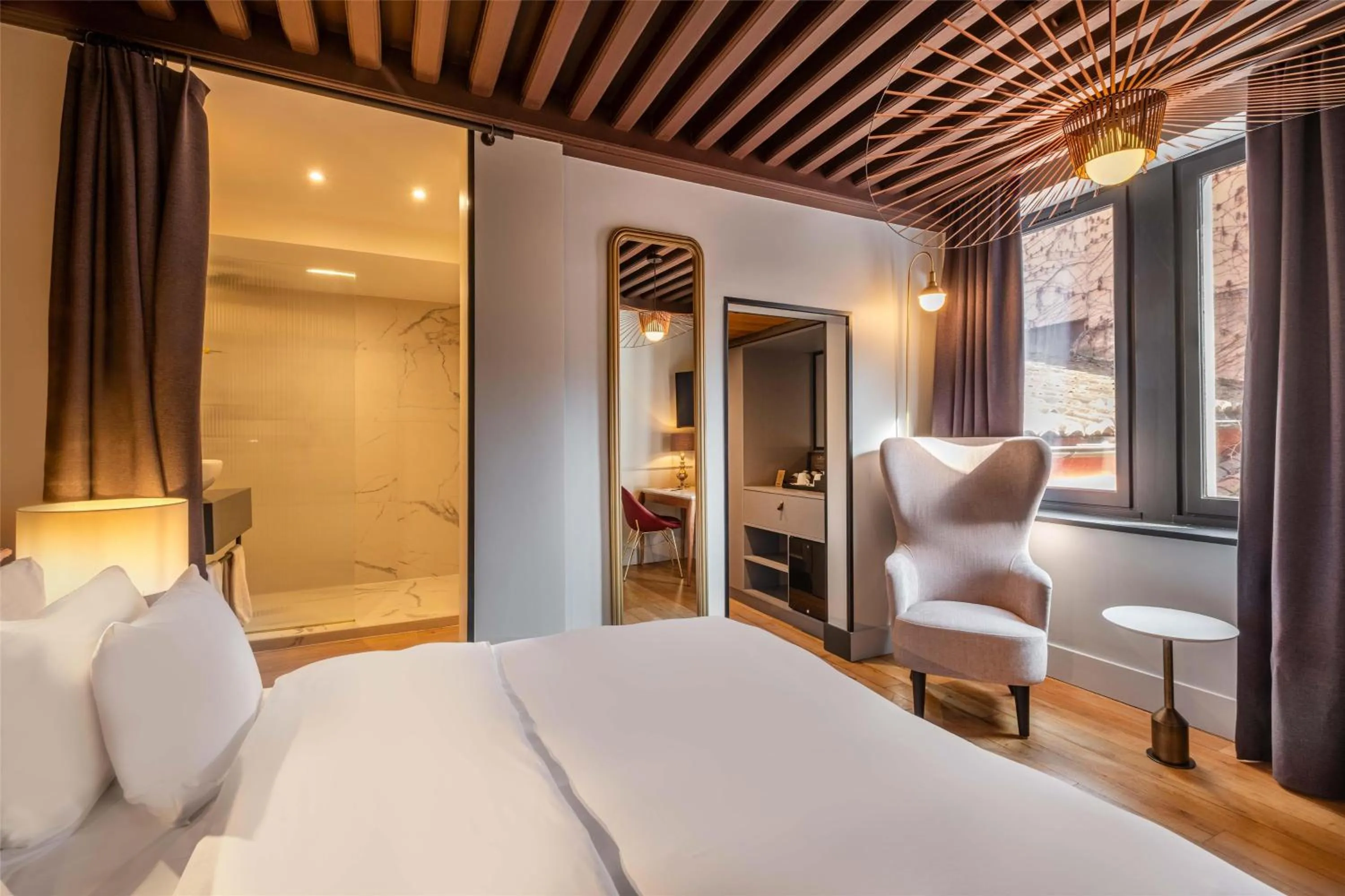 Bedroom, Bed in Cour des Loges Lyon, A Radisson Collection Hotel