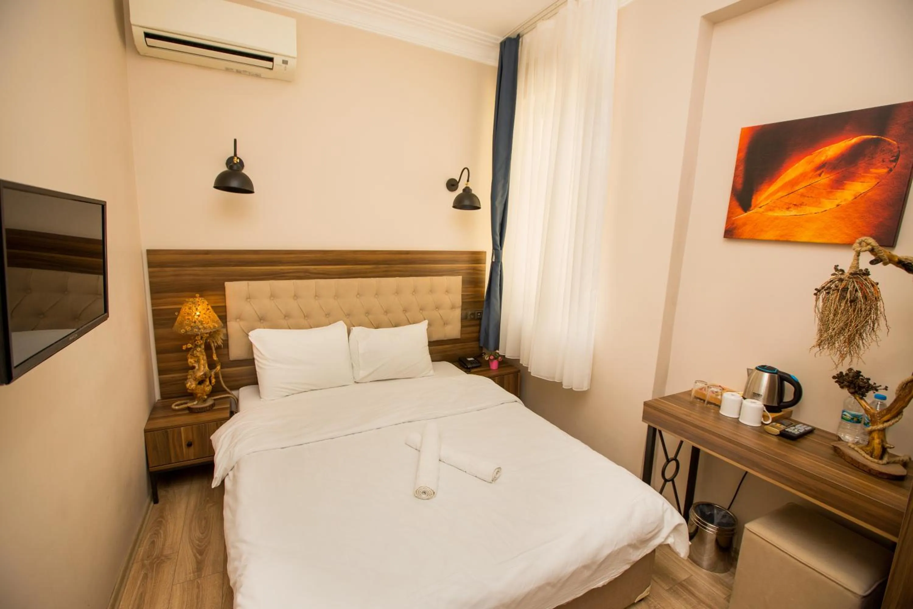 Bed in Corner Garden Hotel