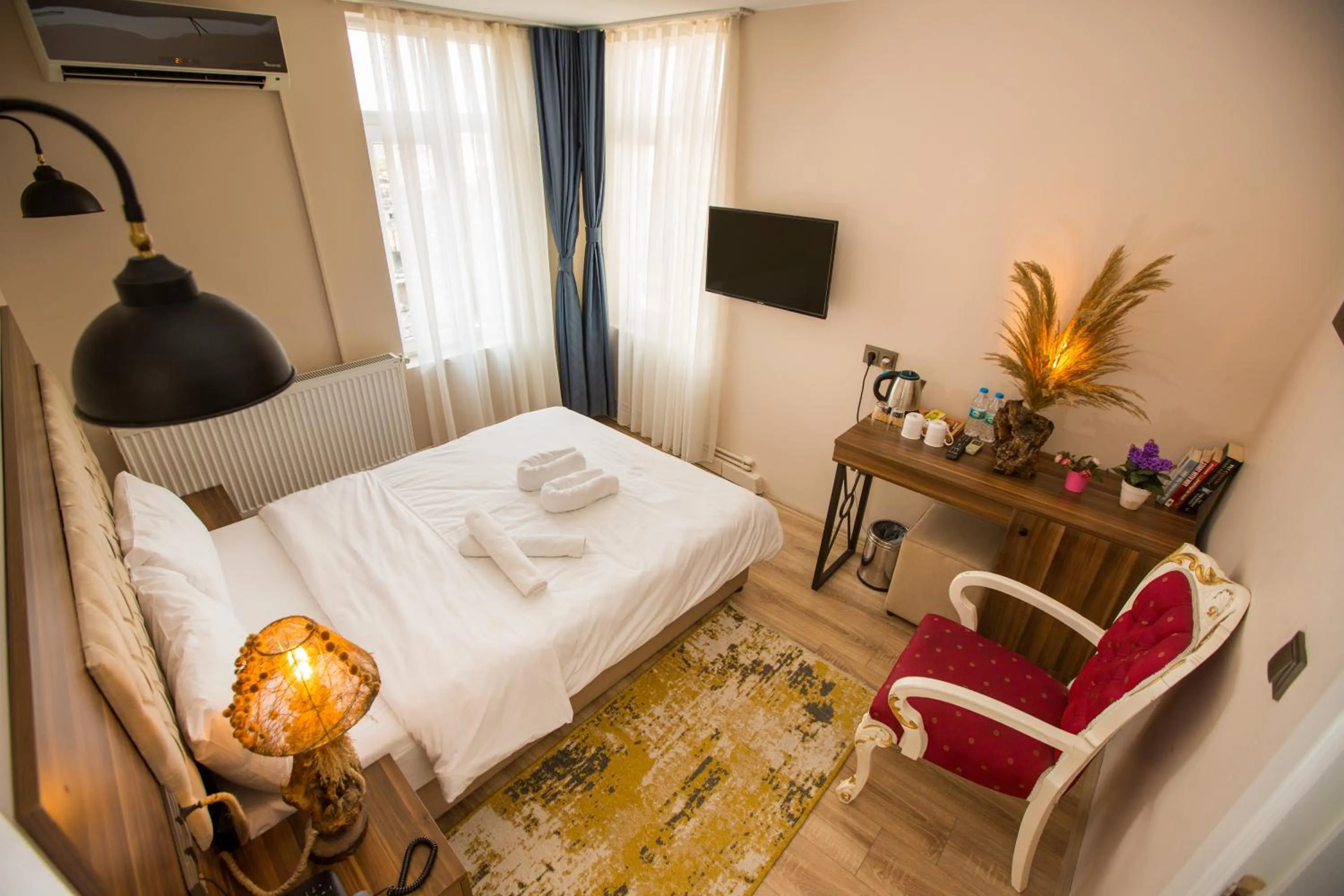 Bed in Corner Garden Hotel